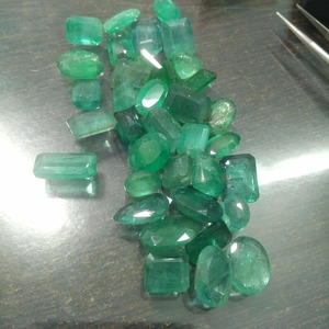 159ct green free size mix cut Zambian emerald parcel