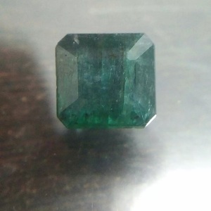 10.28ct deep green octagon cut Zambian emerald | Jewelfields