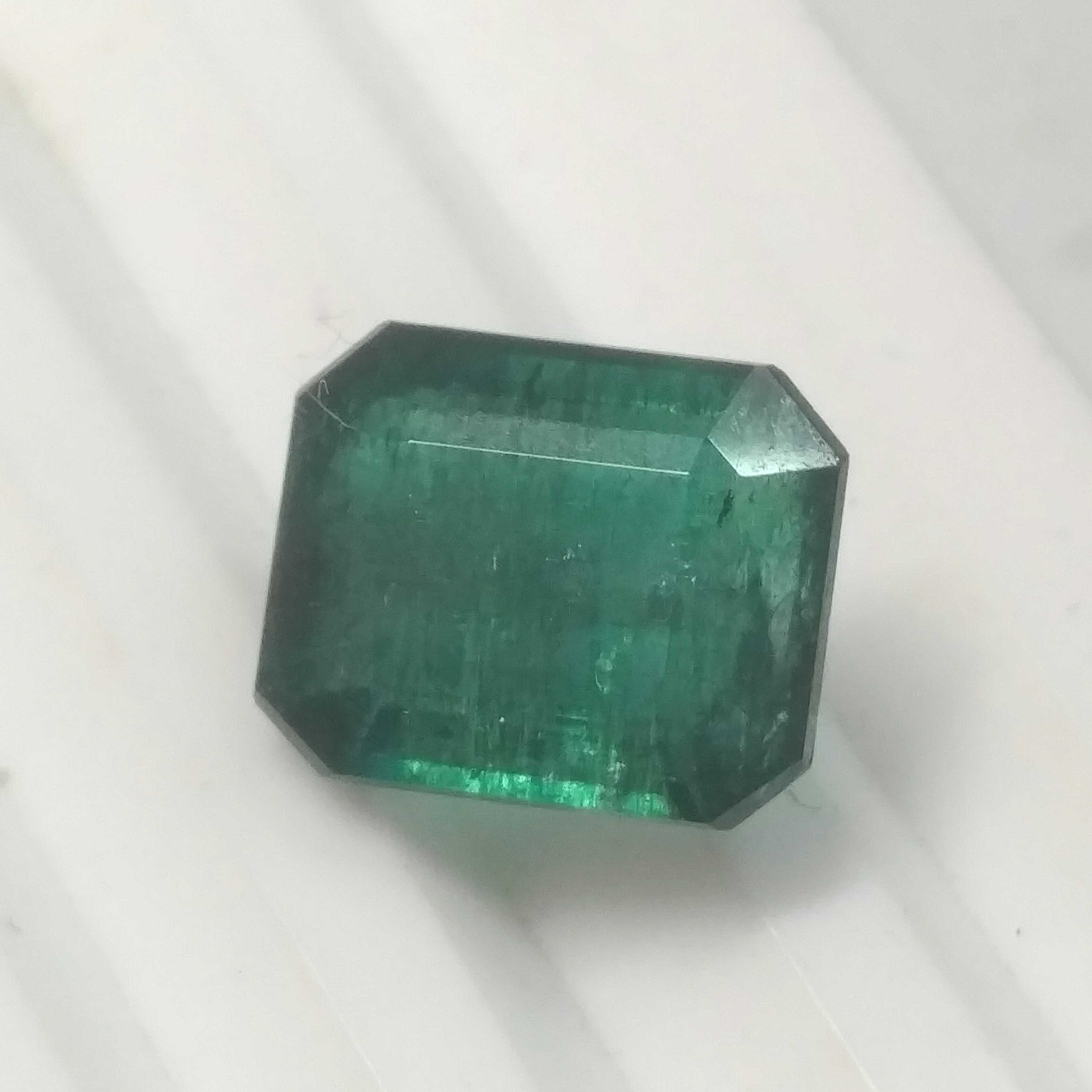 6.59ct octagon step cut deep glaas green Zambian emerald /