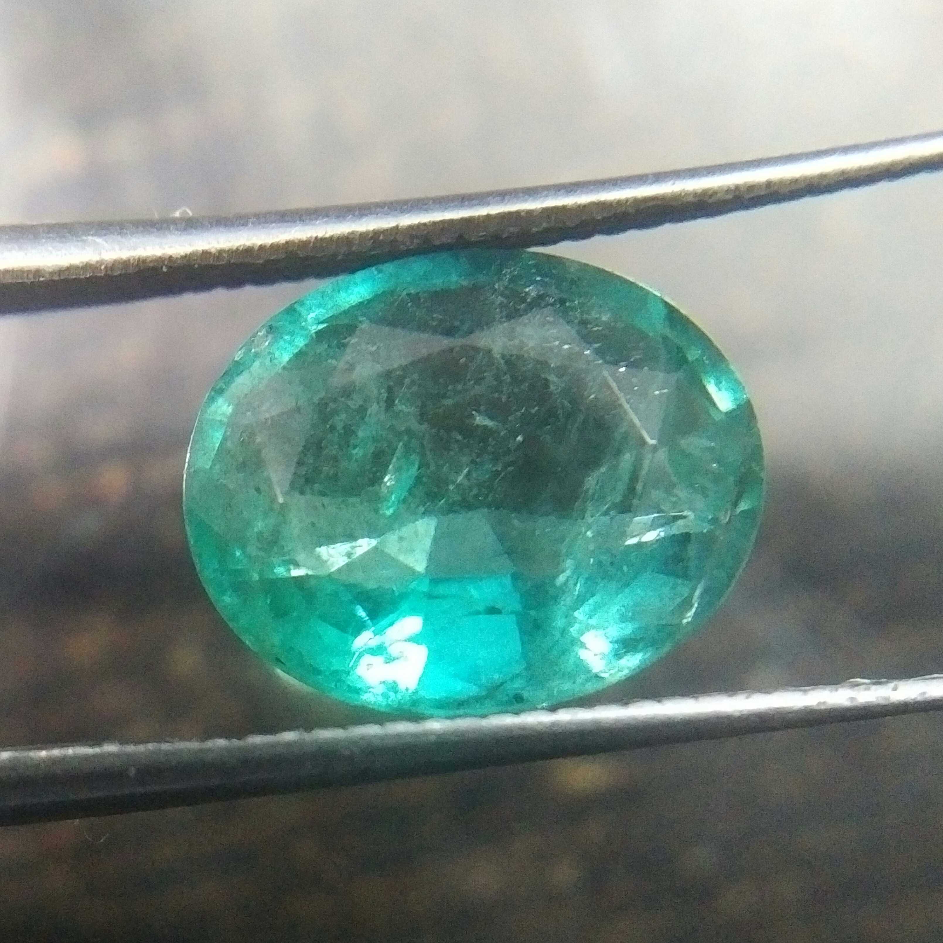 2.95ct bluish green oval Zambian emerald