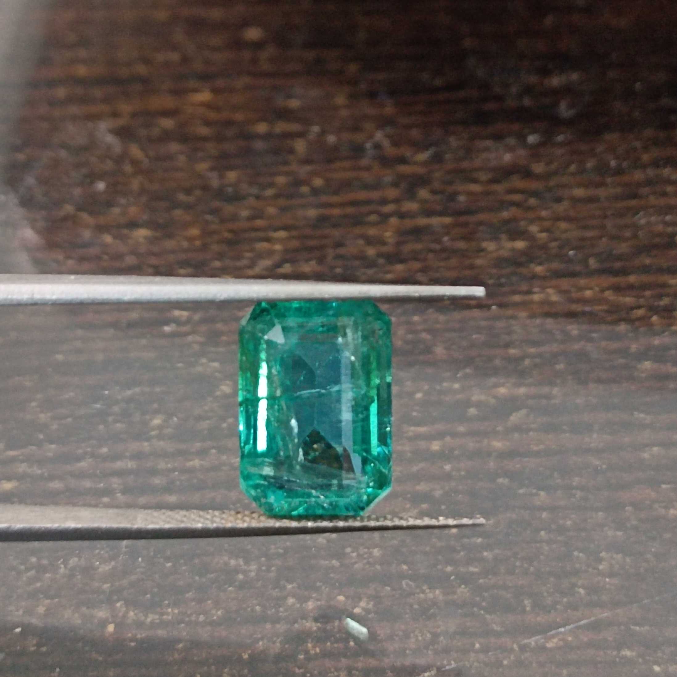 4.04ct algae green emerald cut emerald