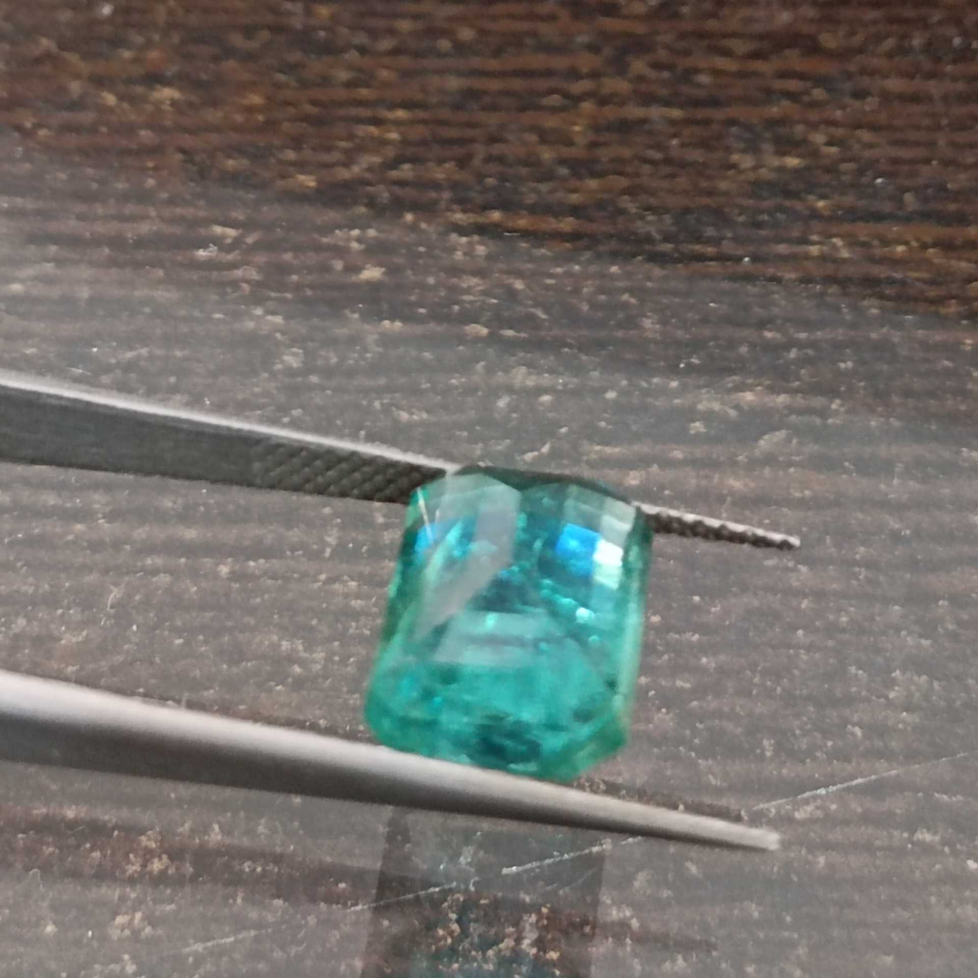 4.04ct algae green emerald cut emerald