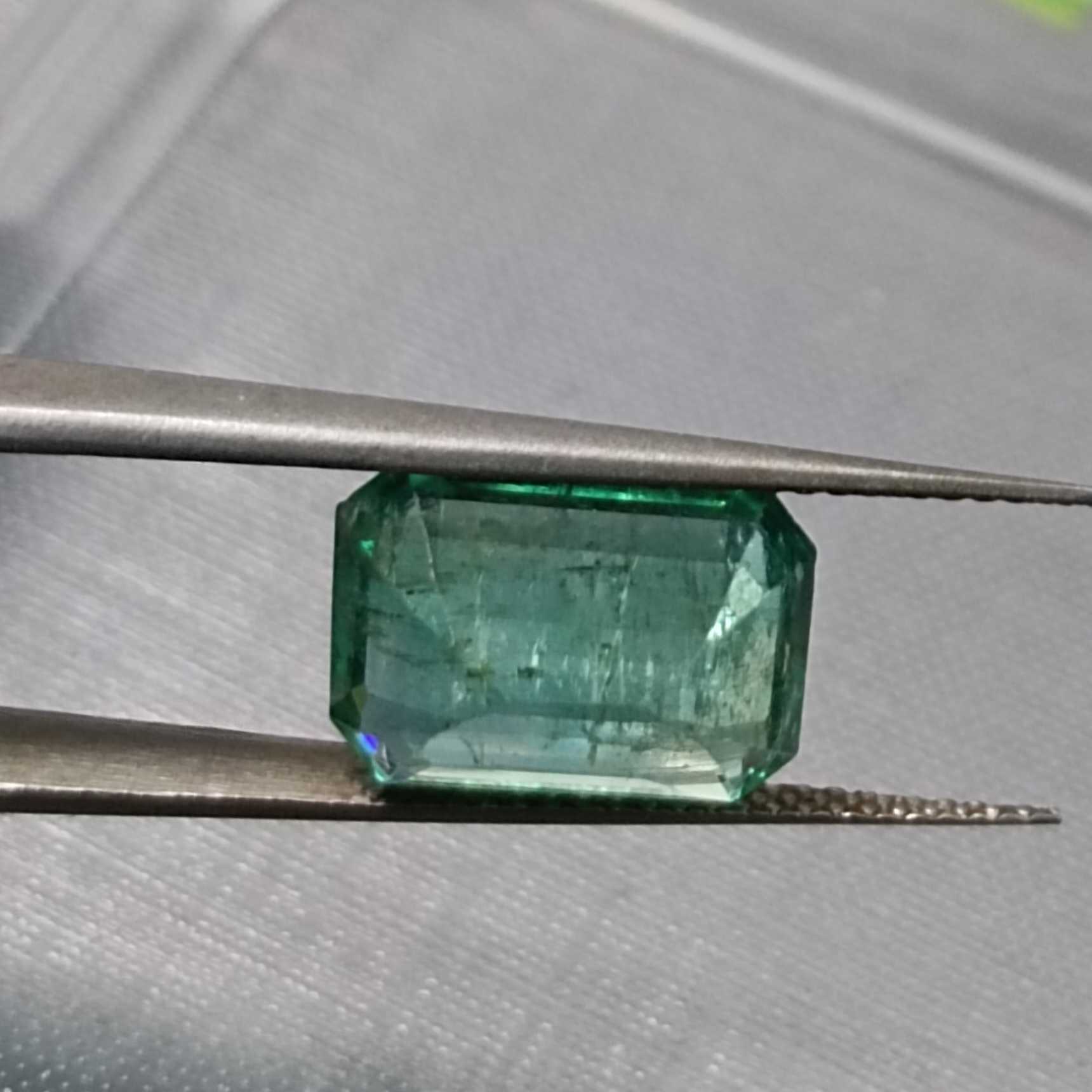 4.50ct bright medium deep green octagon cut emerald