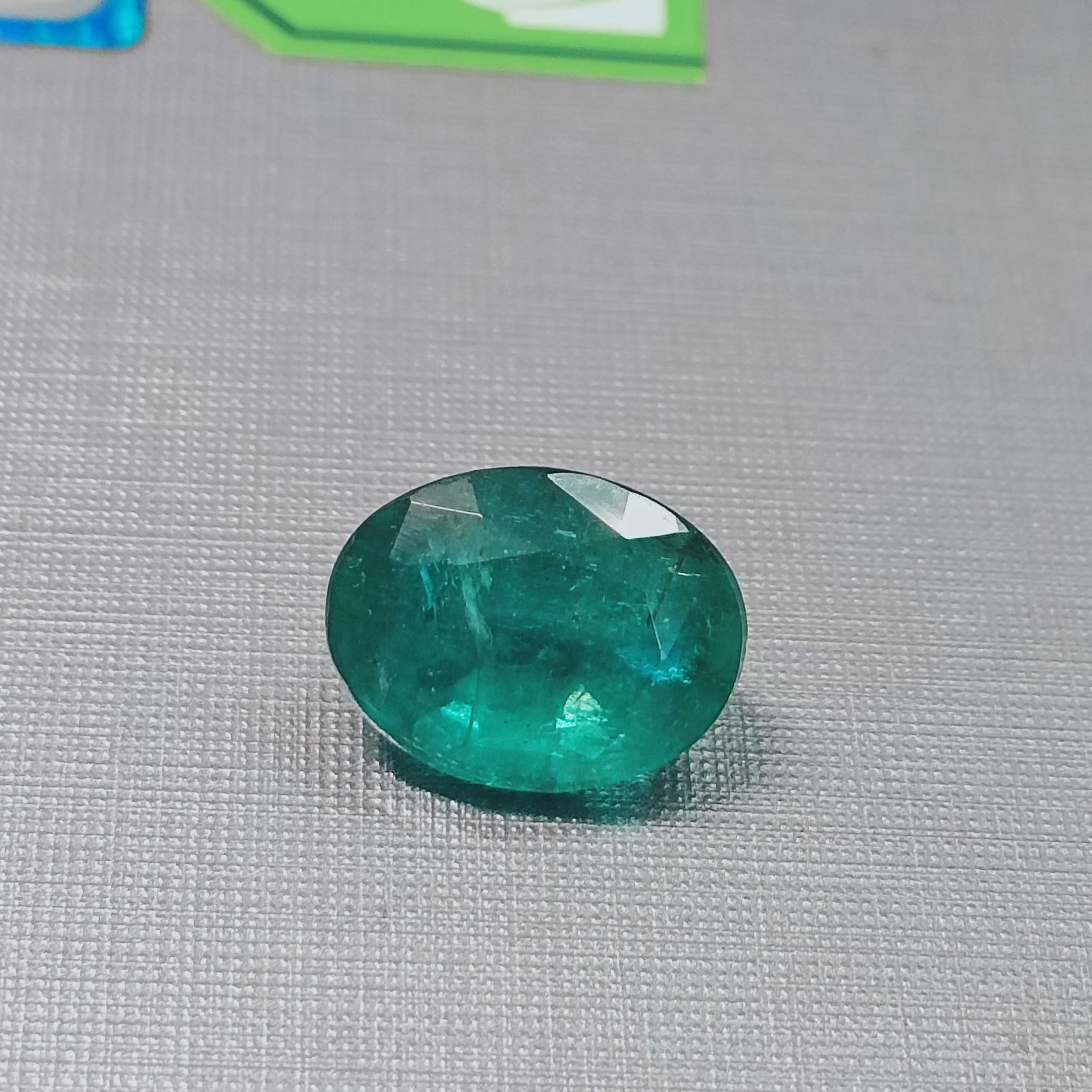 4.84ct ocean green oval step cut Zambian emerald