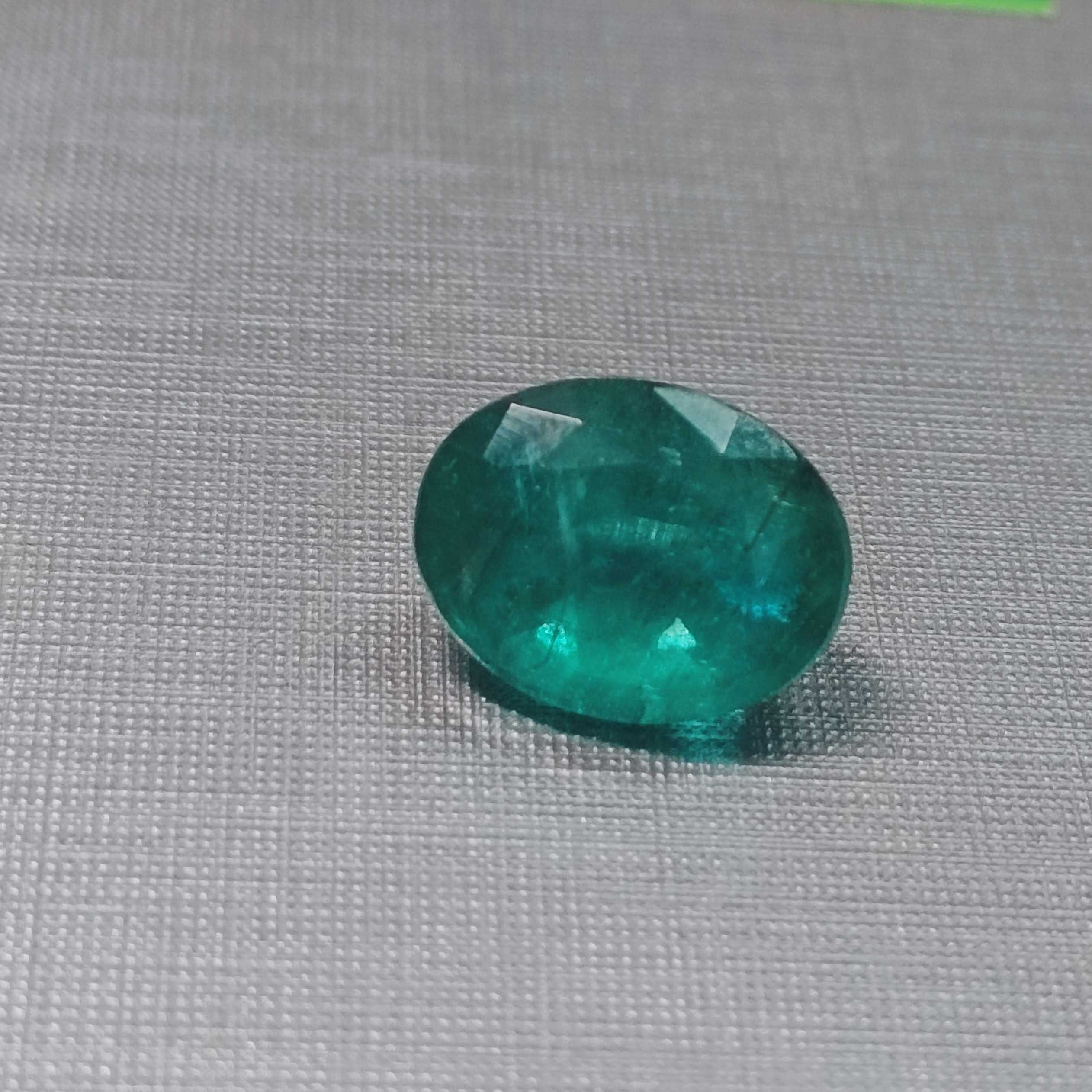 4.84ct ocean green oval step cut Zambian emerald