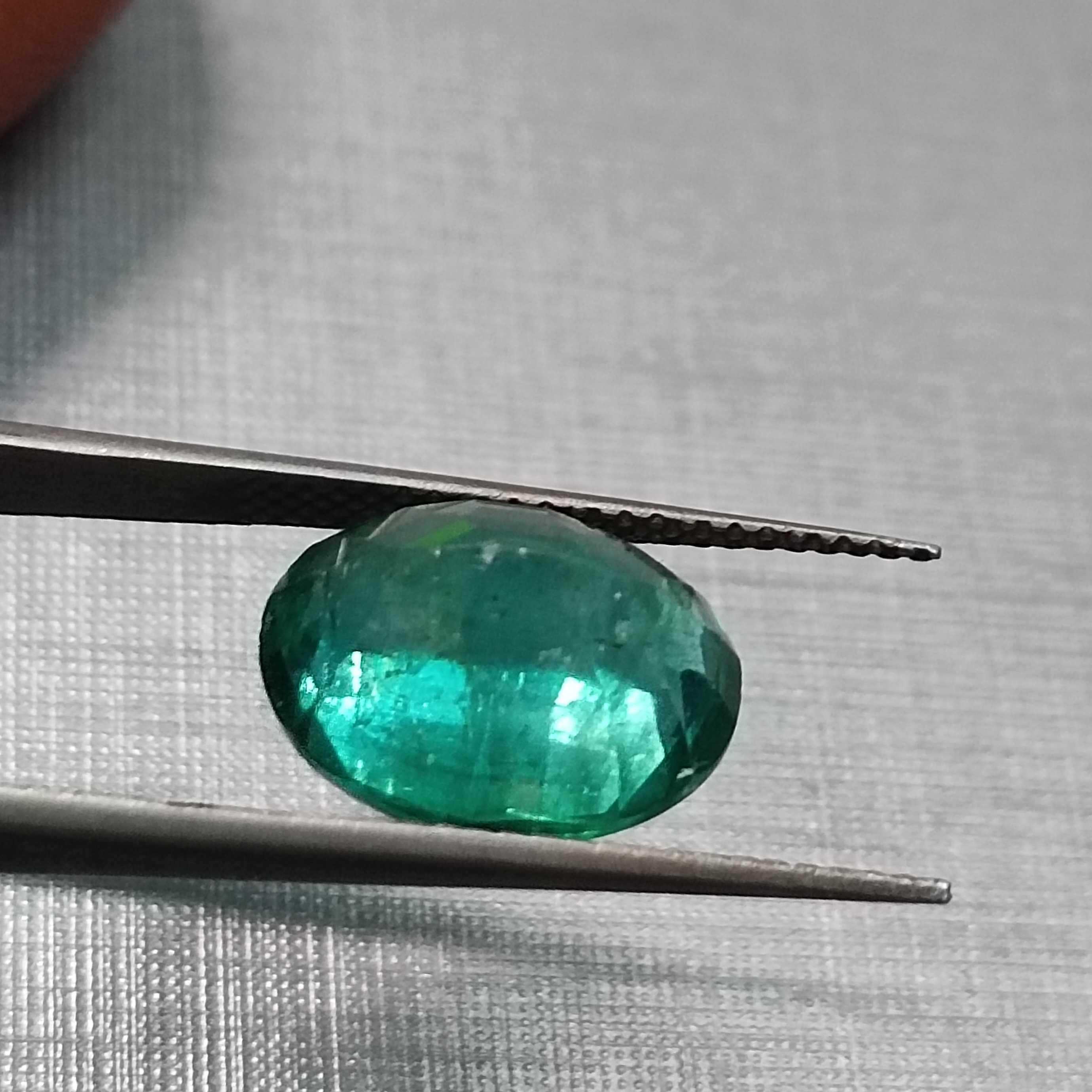 4.84ct ocean green oval step cut Zambian emerald