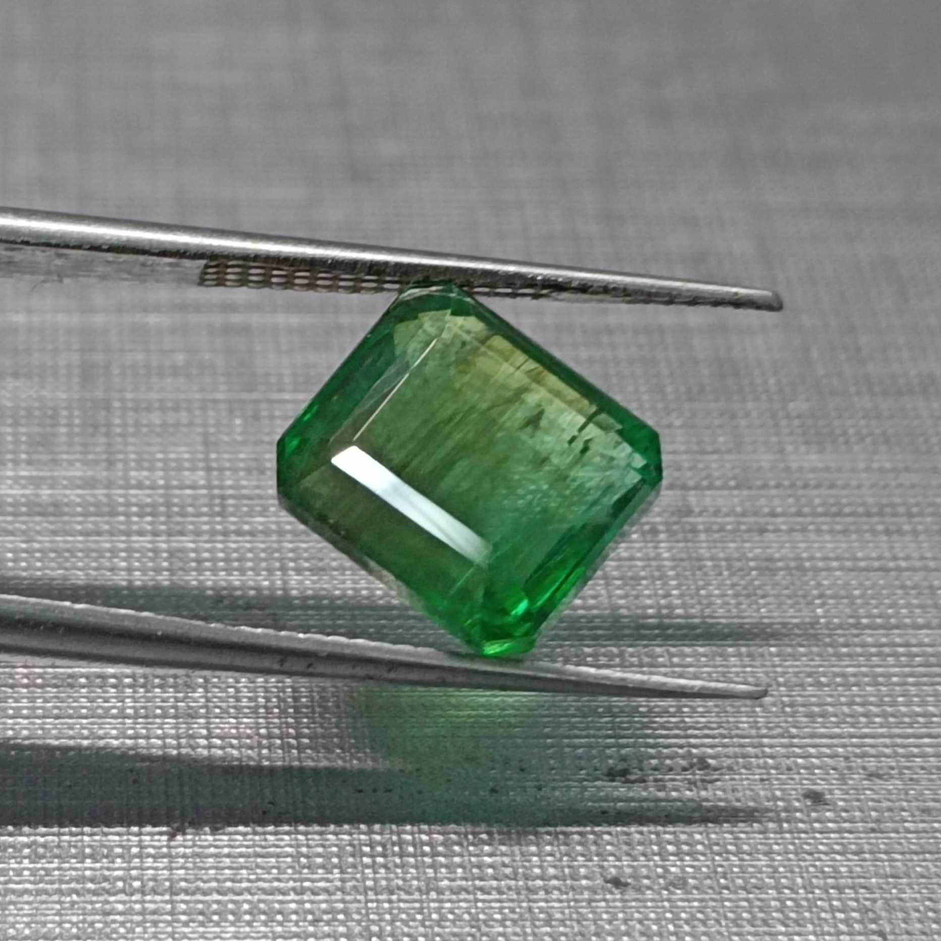 3.91ct neon green octagon shape emerald 