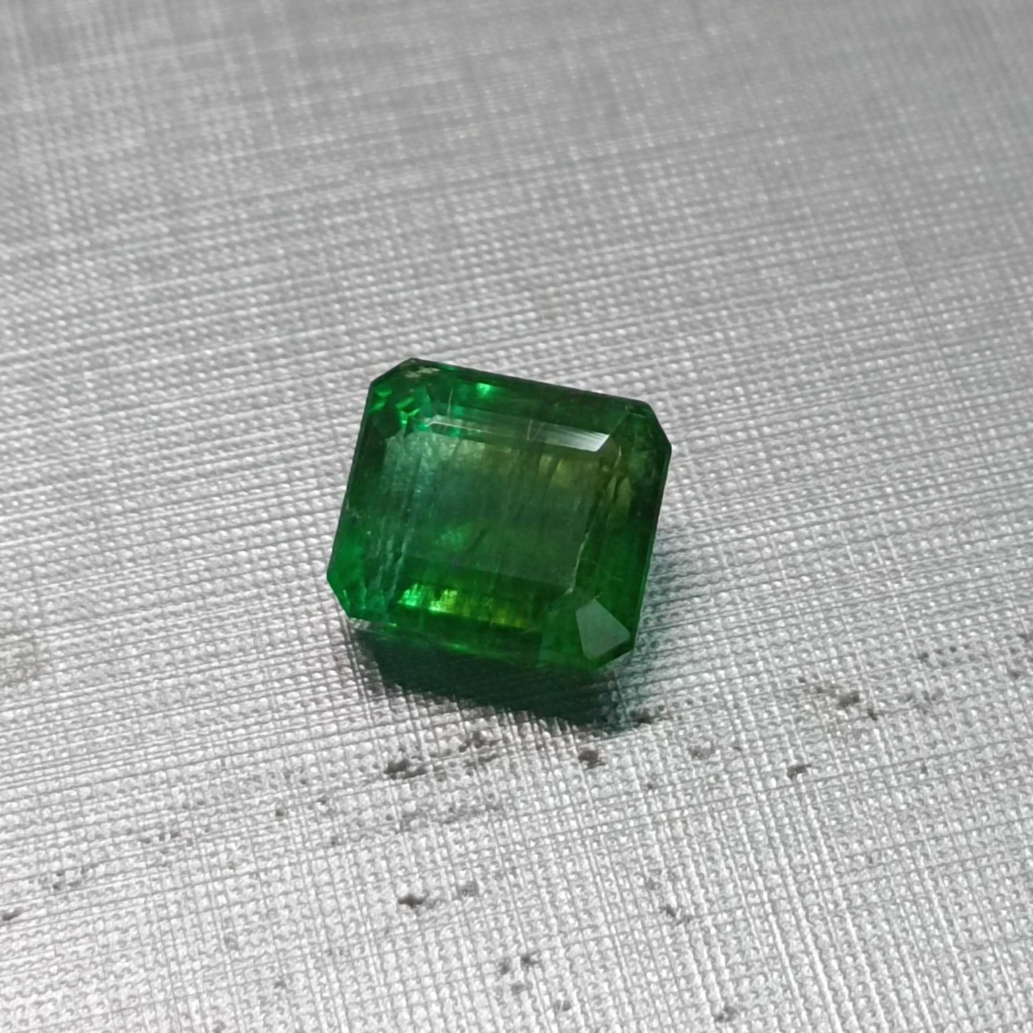 3.91ct neon green octagon shape emerald 