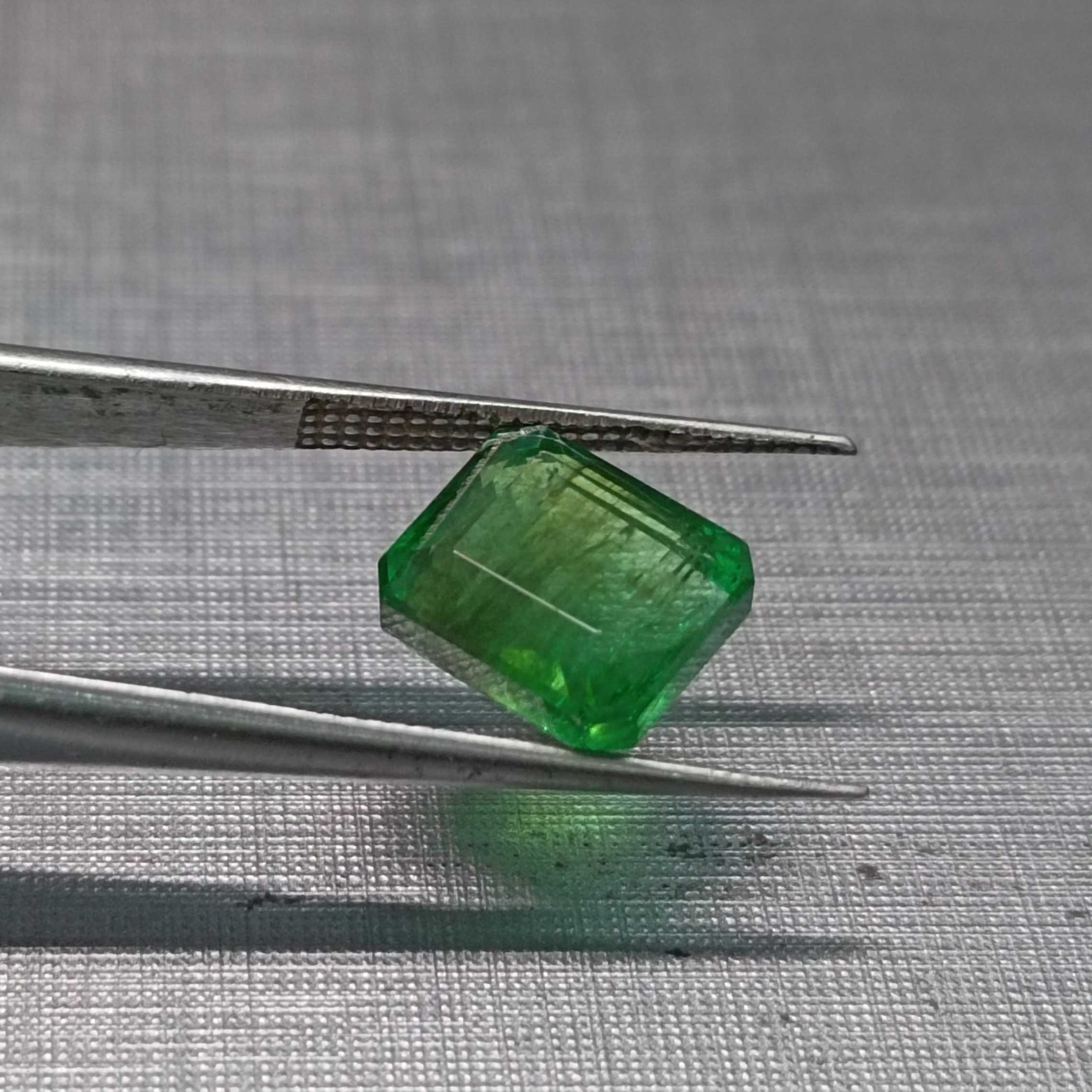 3.91ct neon green octagon shape emerald 