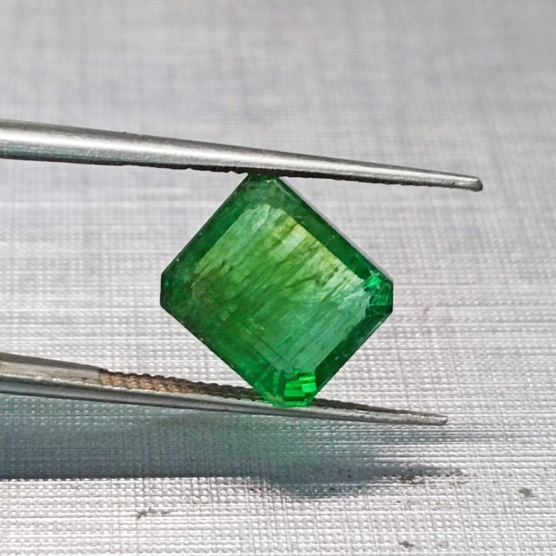 3.91ct neon green octagon shape emerald 