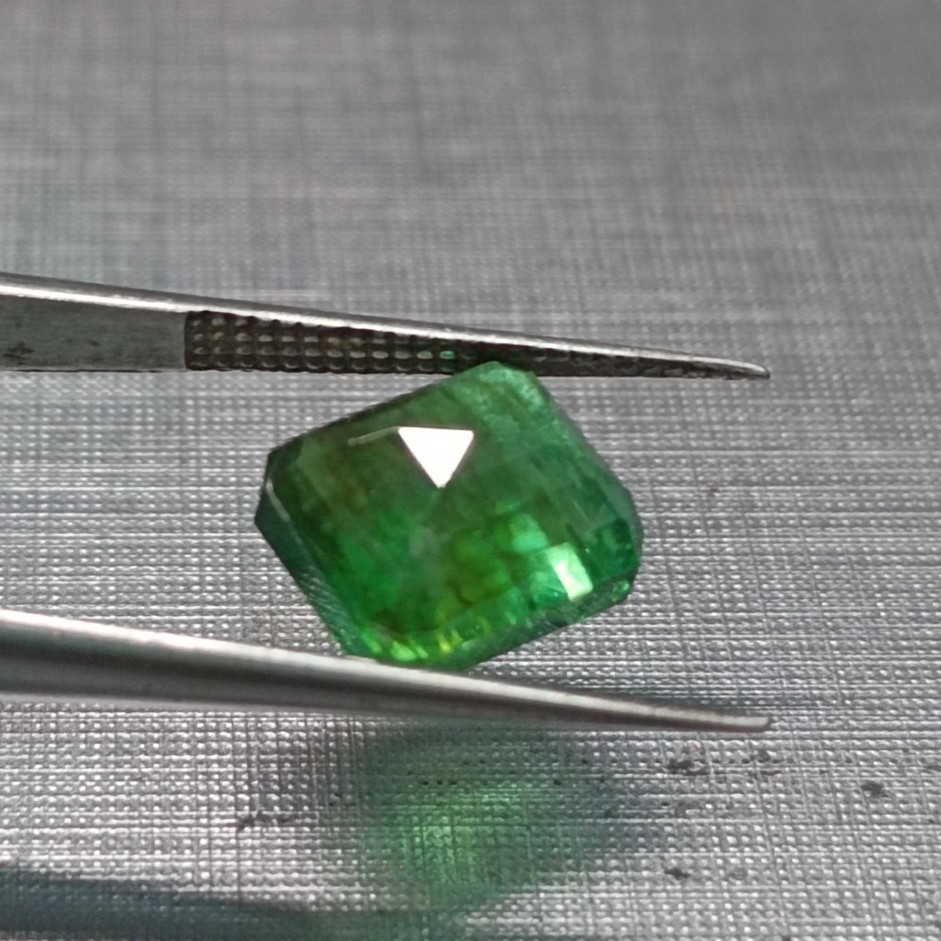 3.91ct neon green octagon shape emerald 