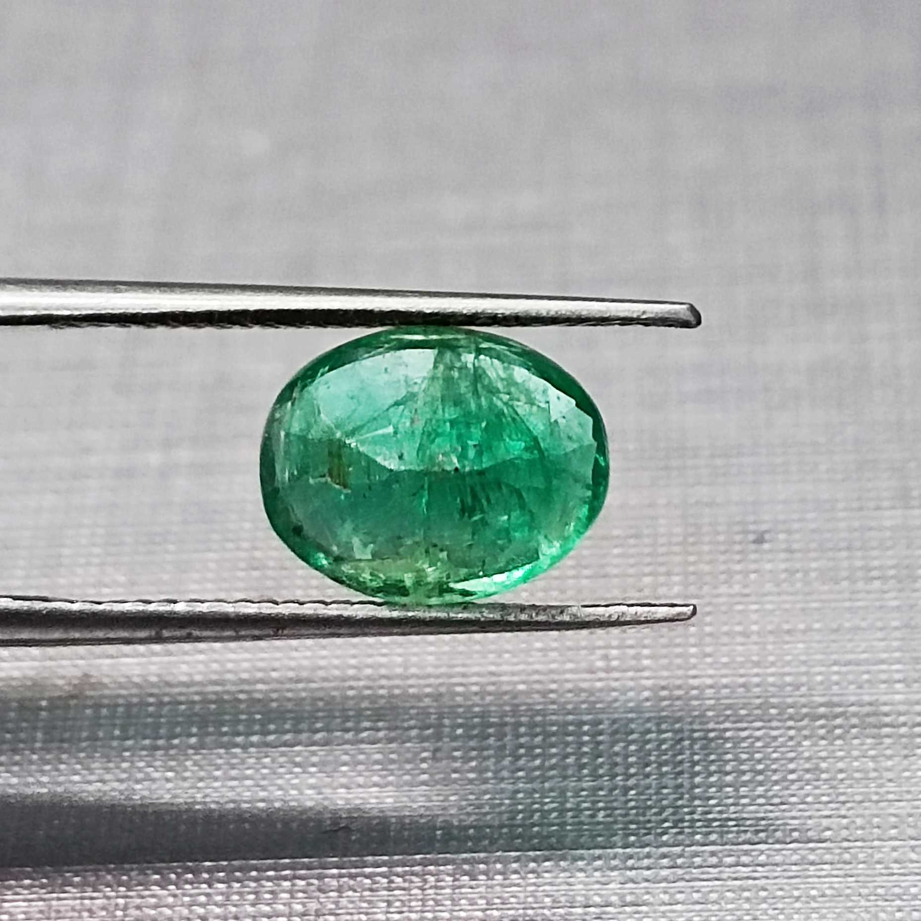 1.82ct deep vivid green oval cut emerald