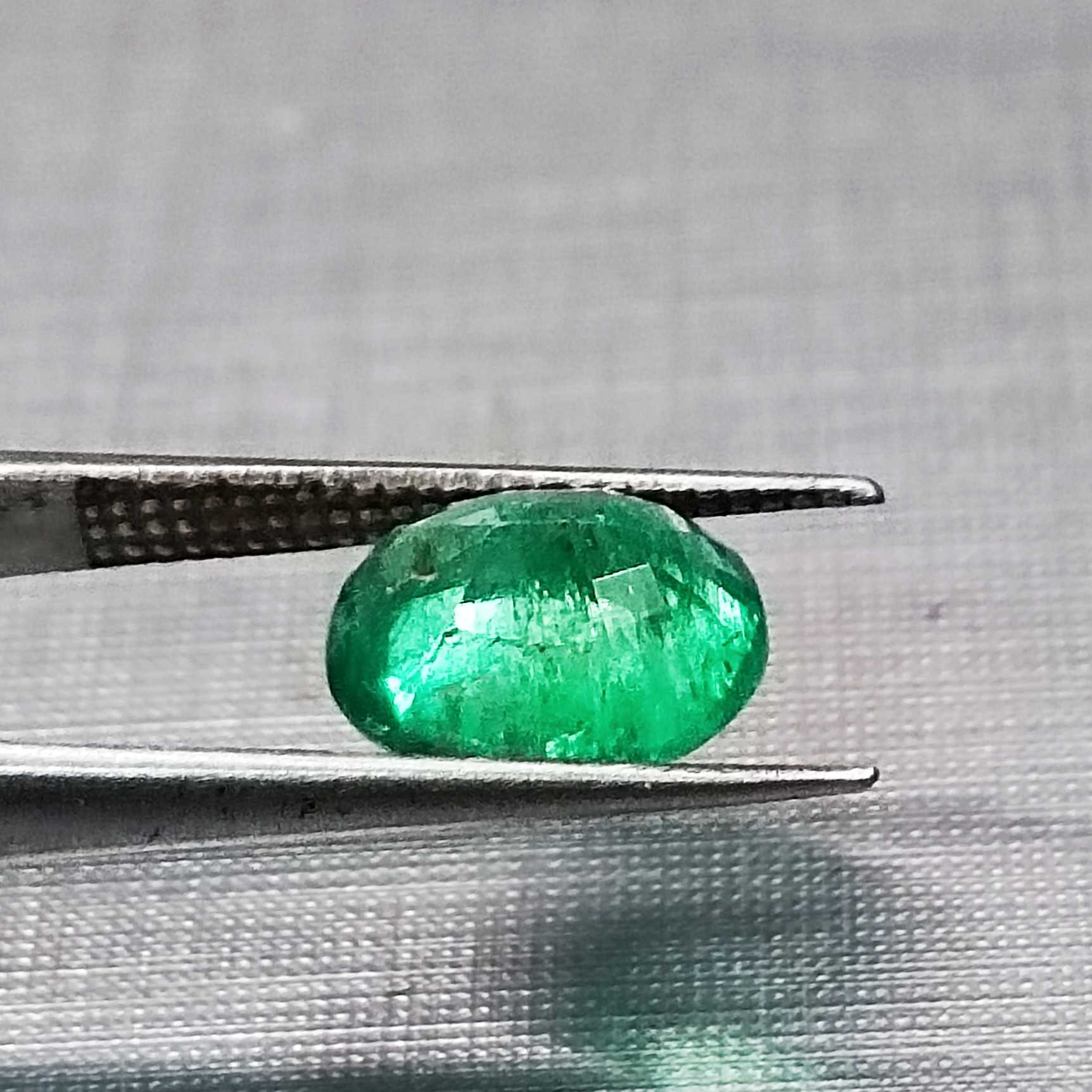 1.82ct deep vivid green oval cut emerald