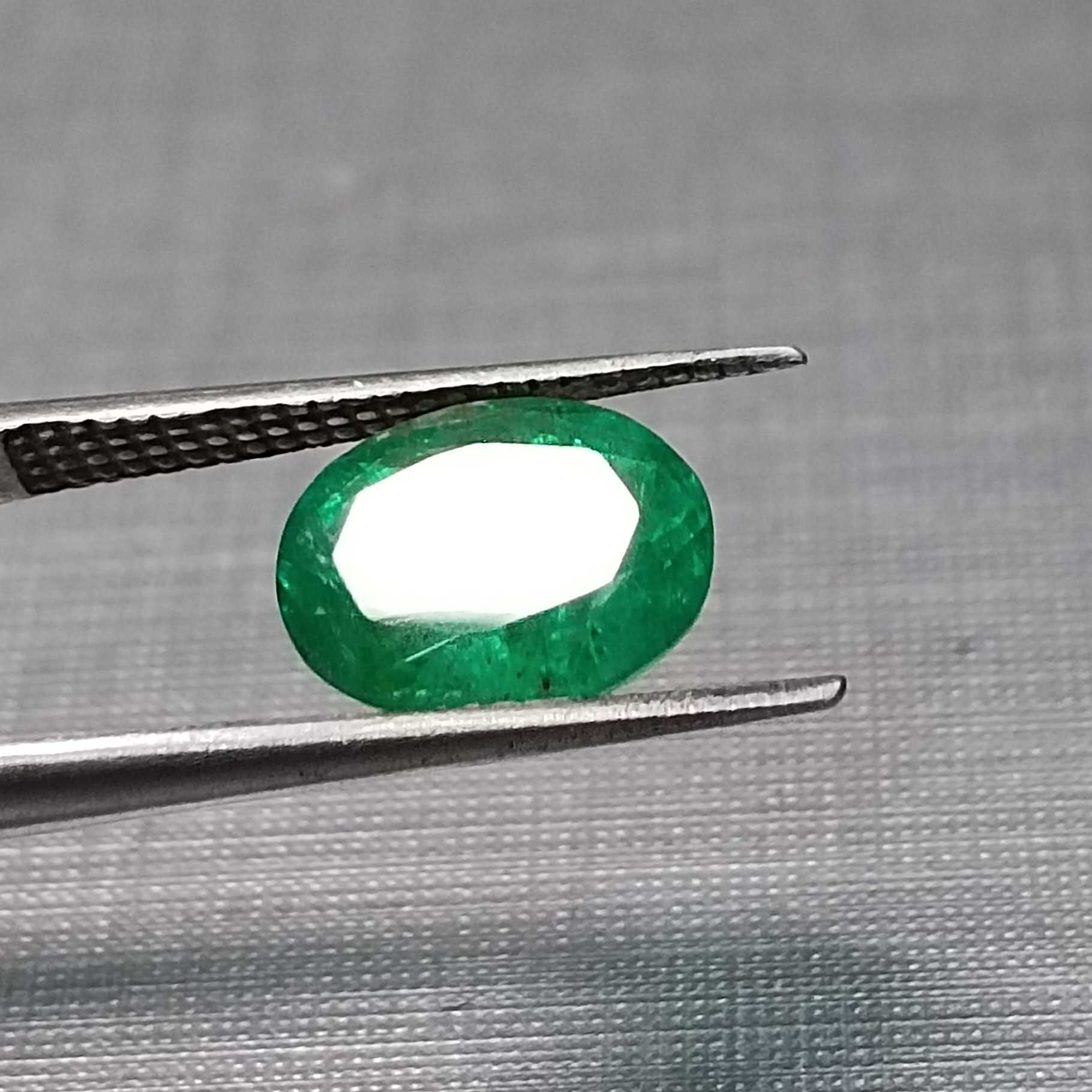 1.82ct deep vivid green oval cut emerald