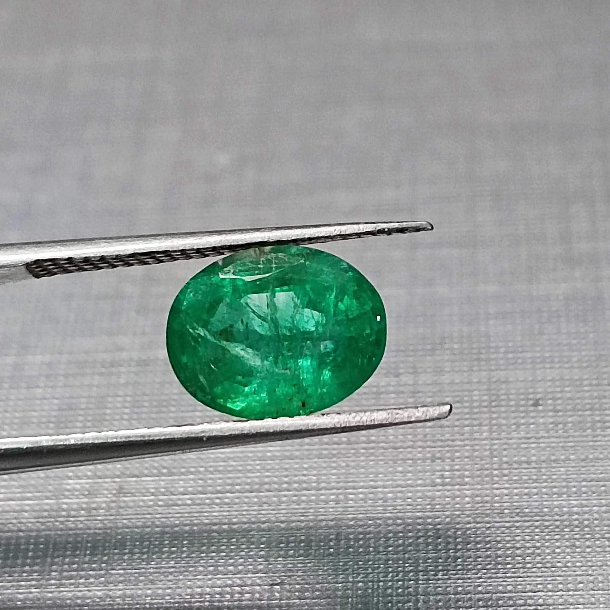 1.82ct deep vivid green oval cut emerald