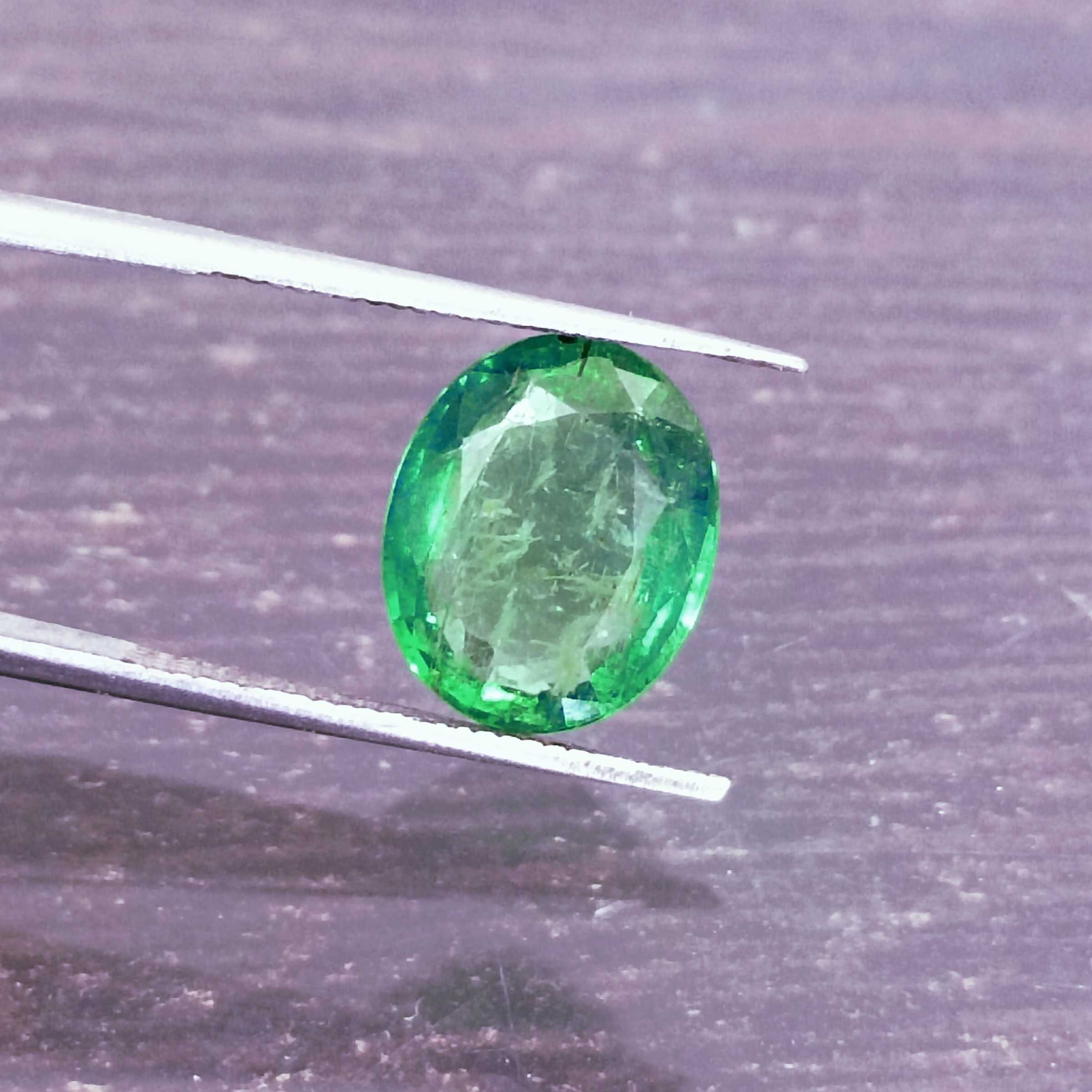 3.02ct golden green oval cut emerald /