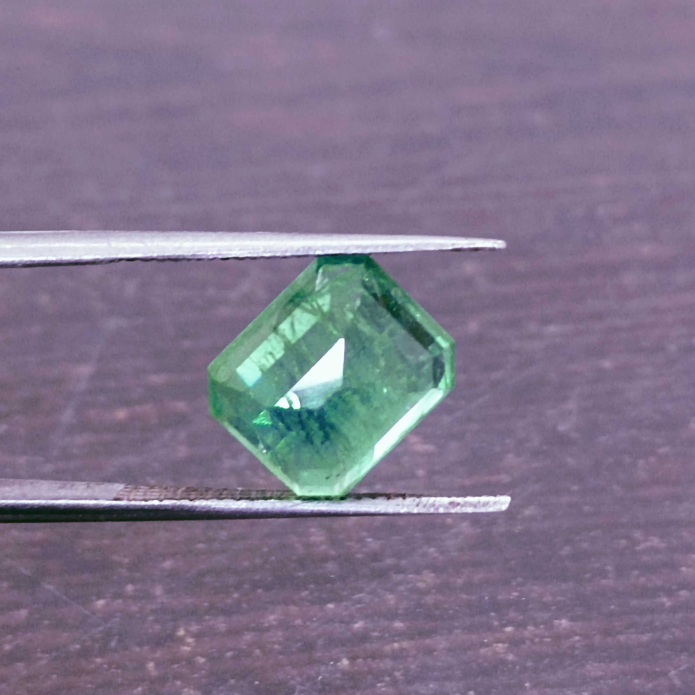 3.80ct neon green octagon cut Colombian emerald 