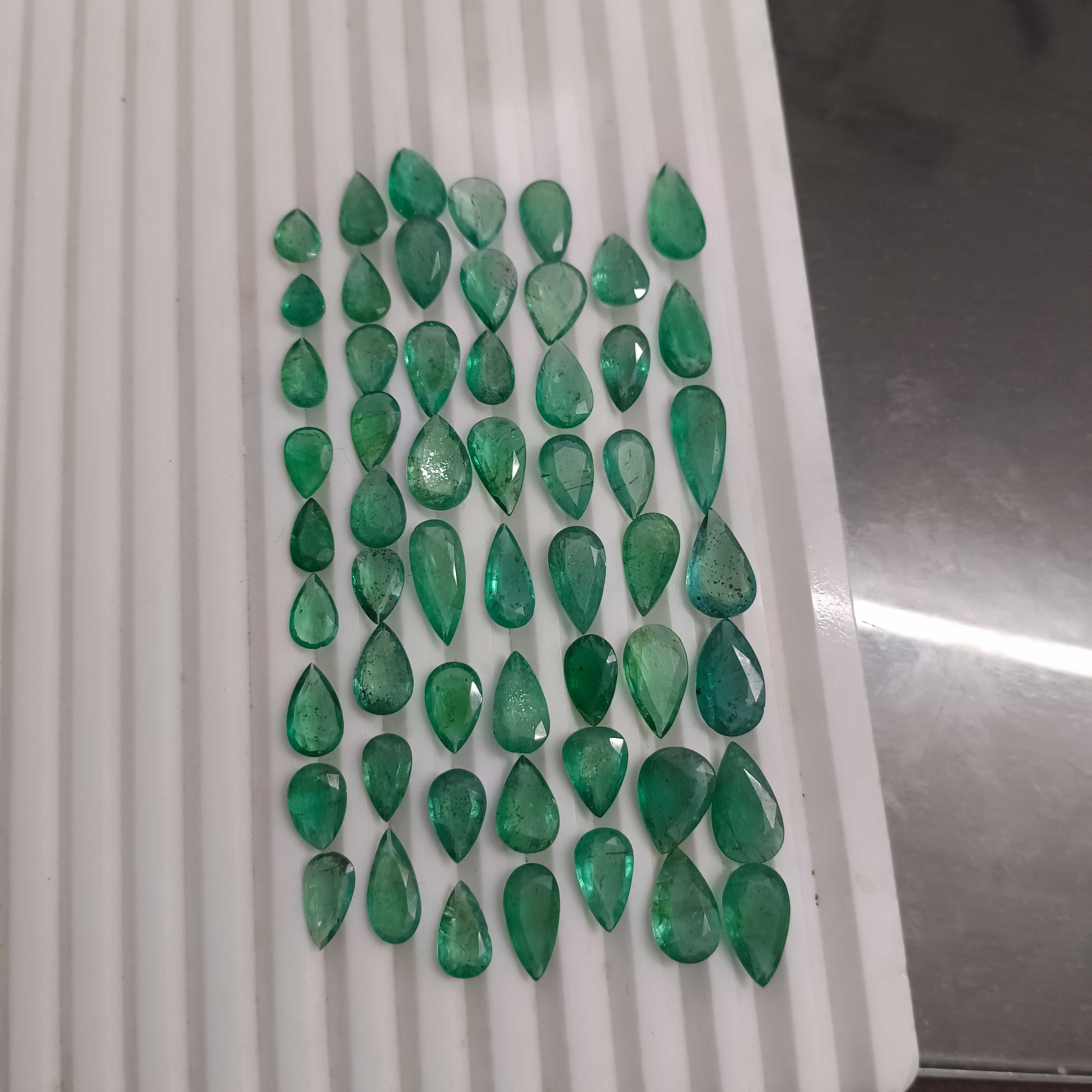 97ct pear shape medium green emerald layout parcel