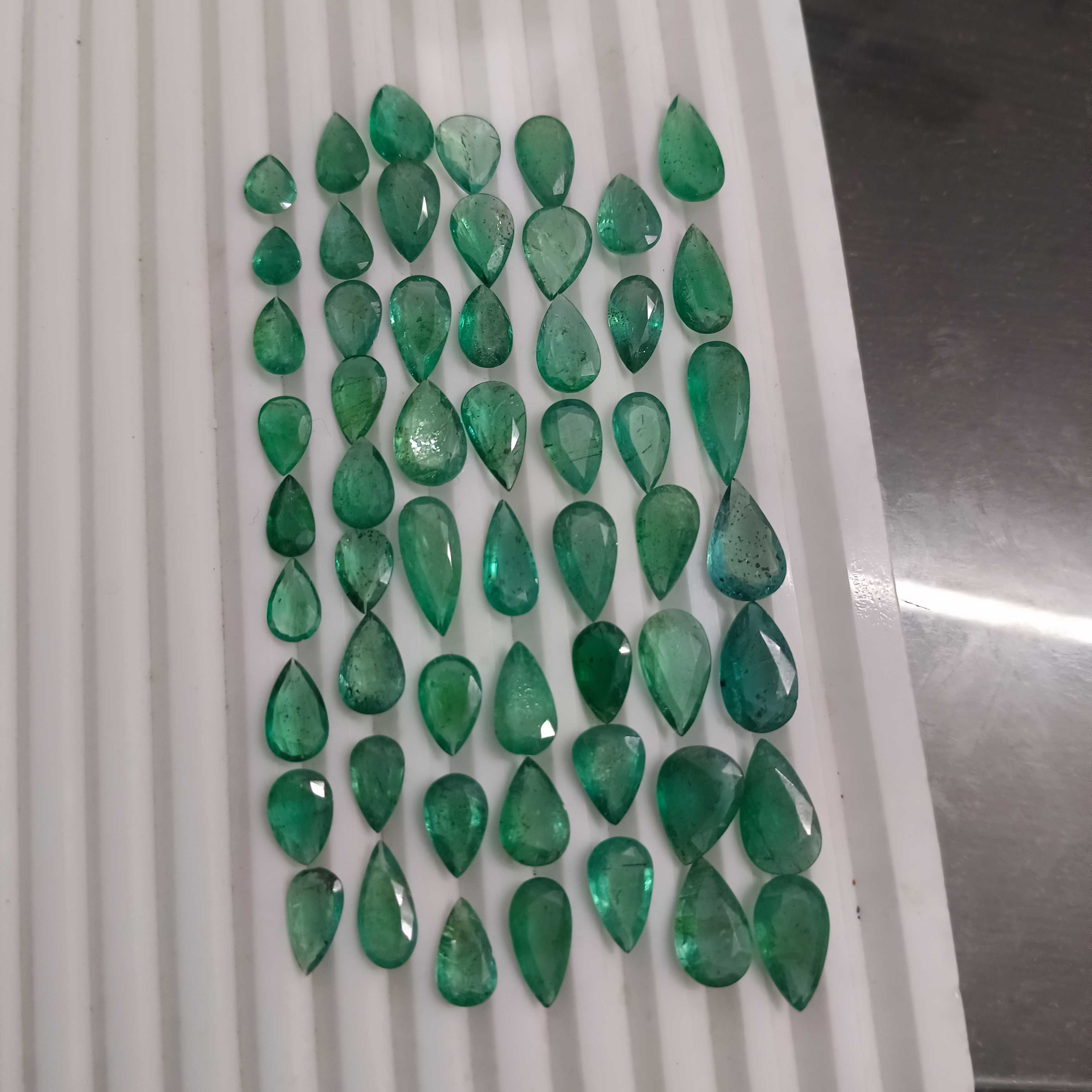 97ct pear shape medium green emerald layout parcel