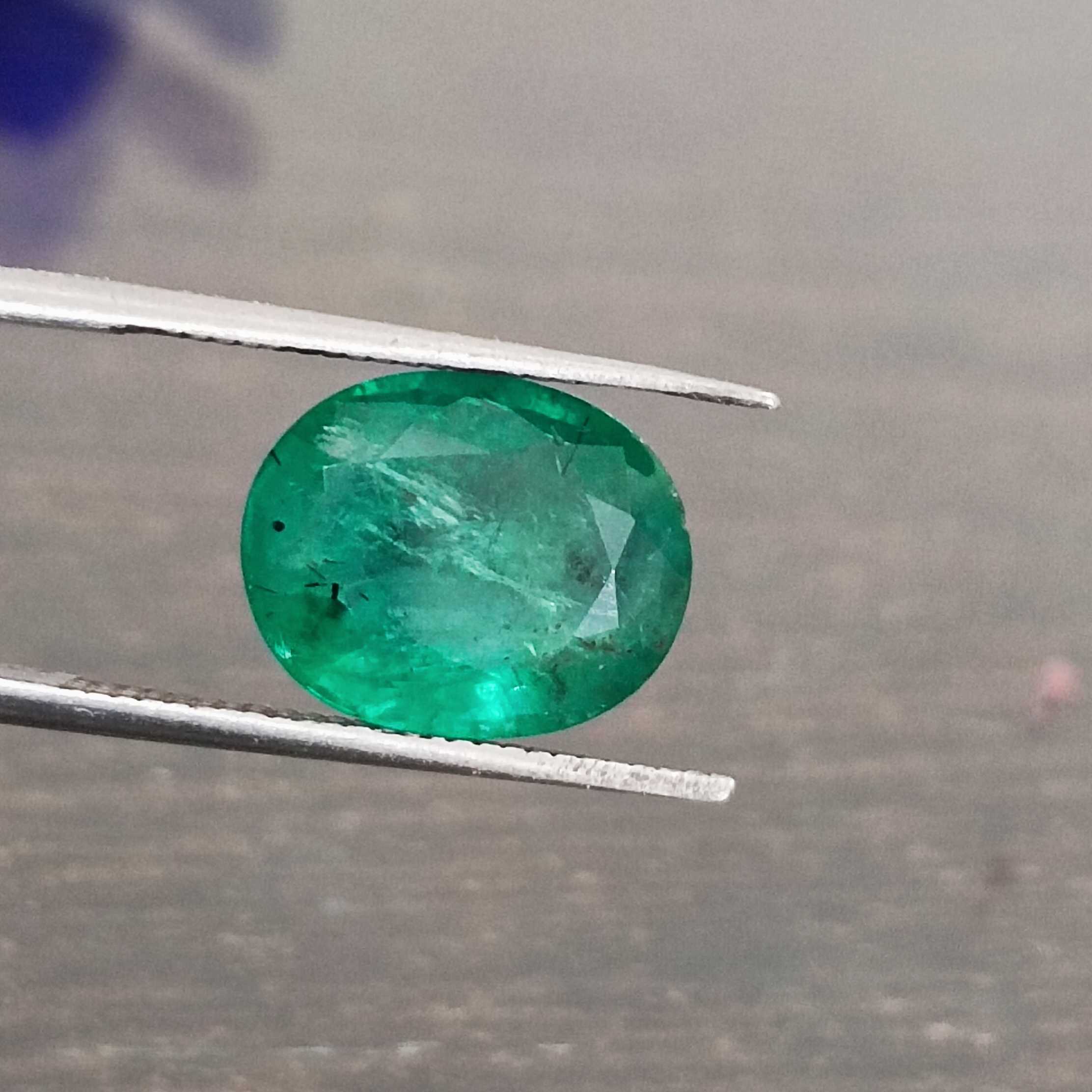 3.57ct deep shiny green oval step cut emerald/