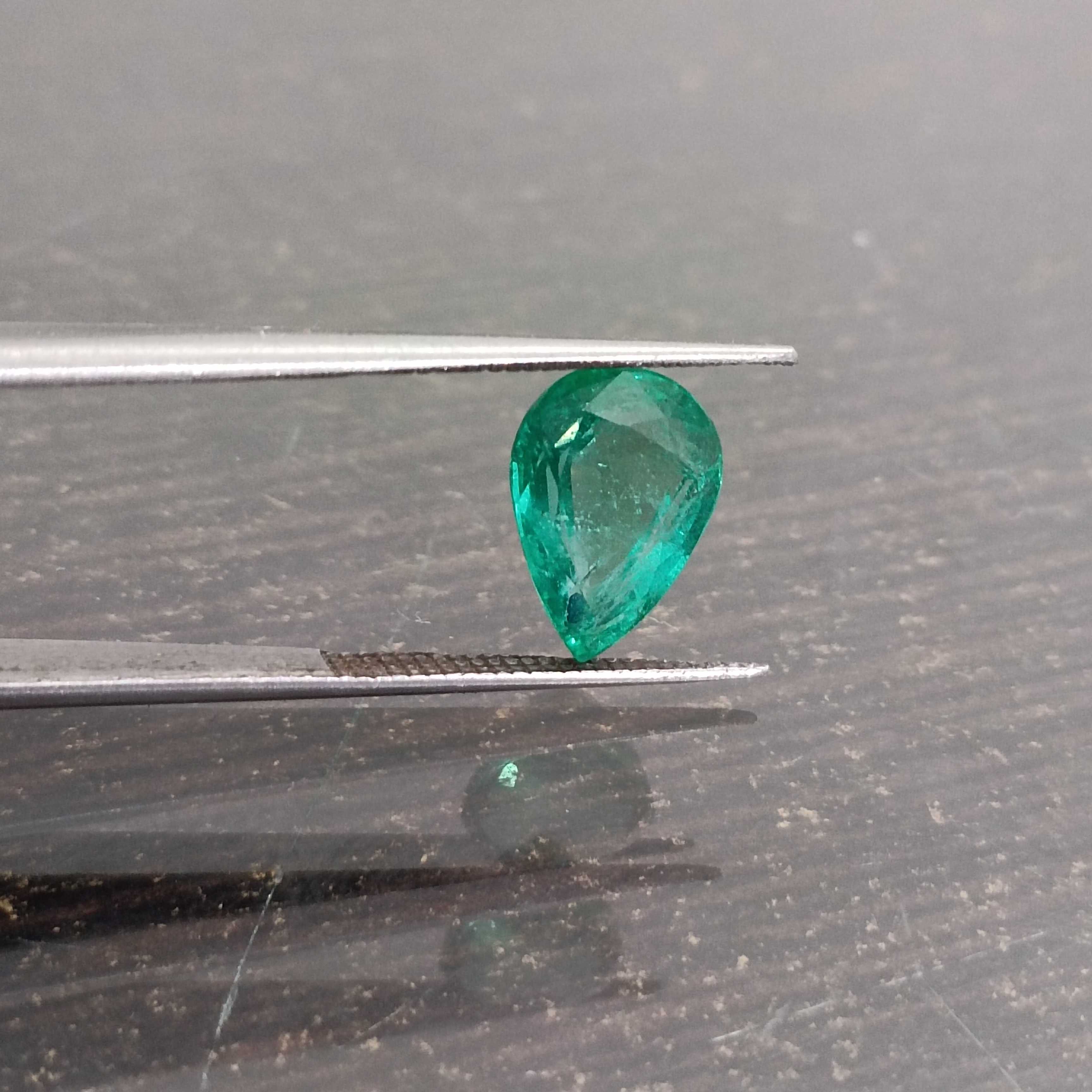 2.70ct medium green pear step cut emerald