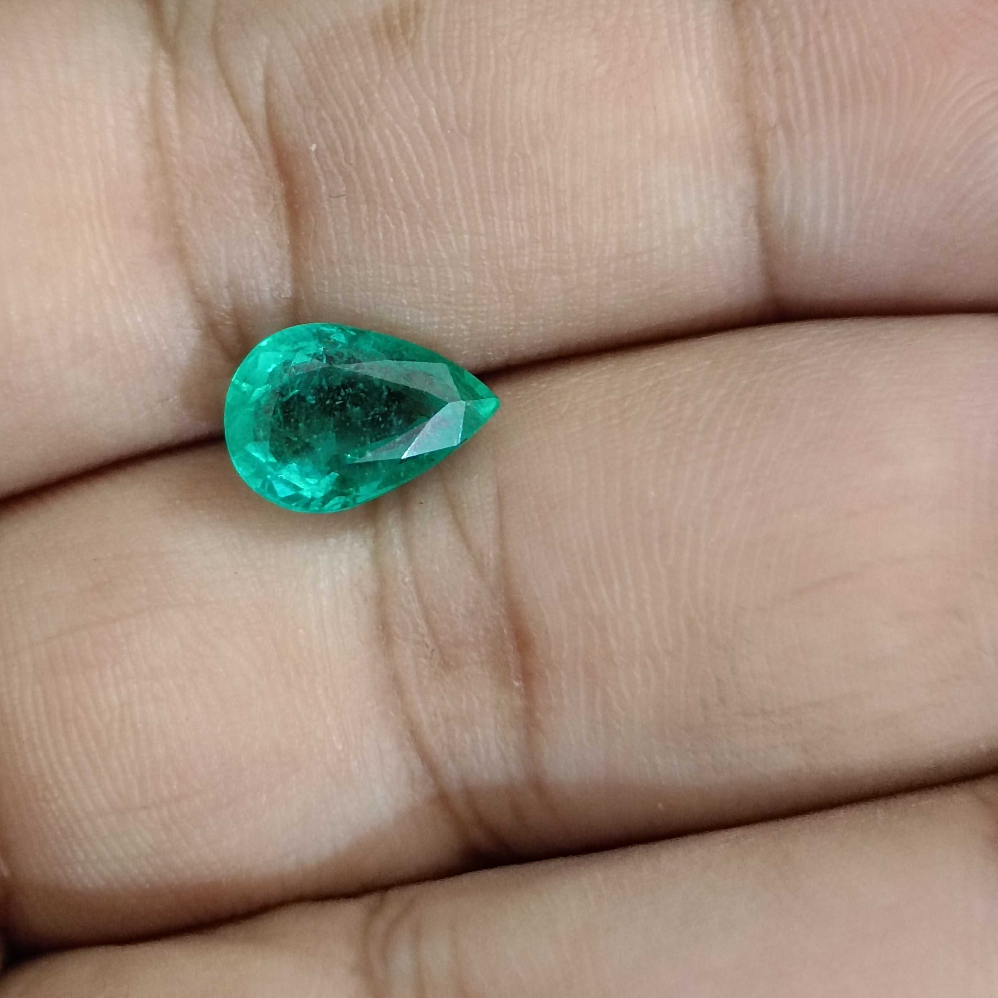 2.70ct medium green pear step cut emerald