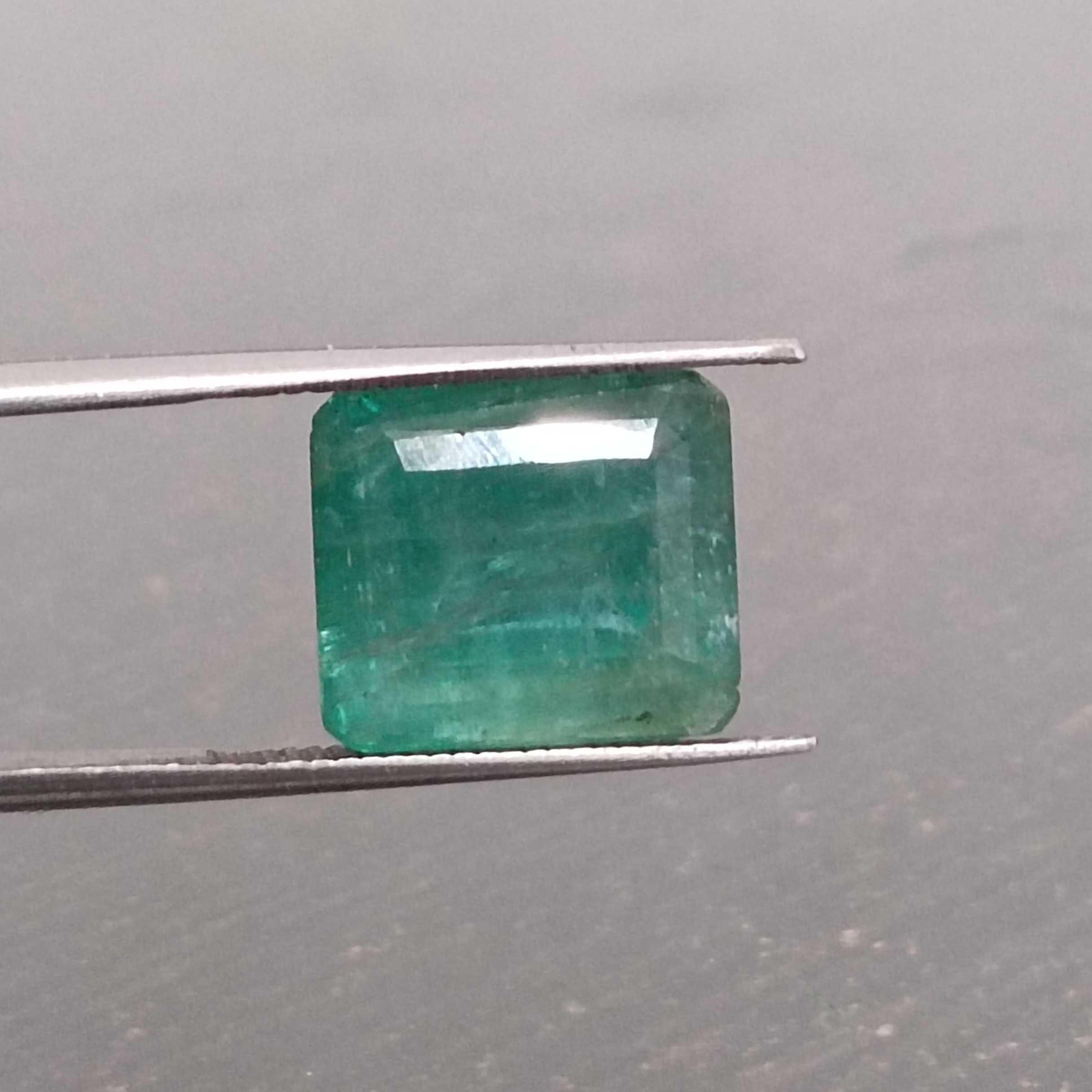 6.36ct deep green one side faceted emerald sugarloaf gem