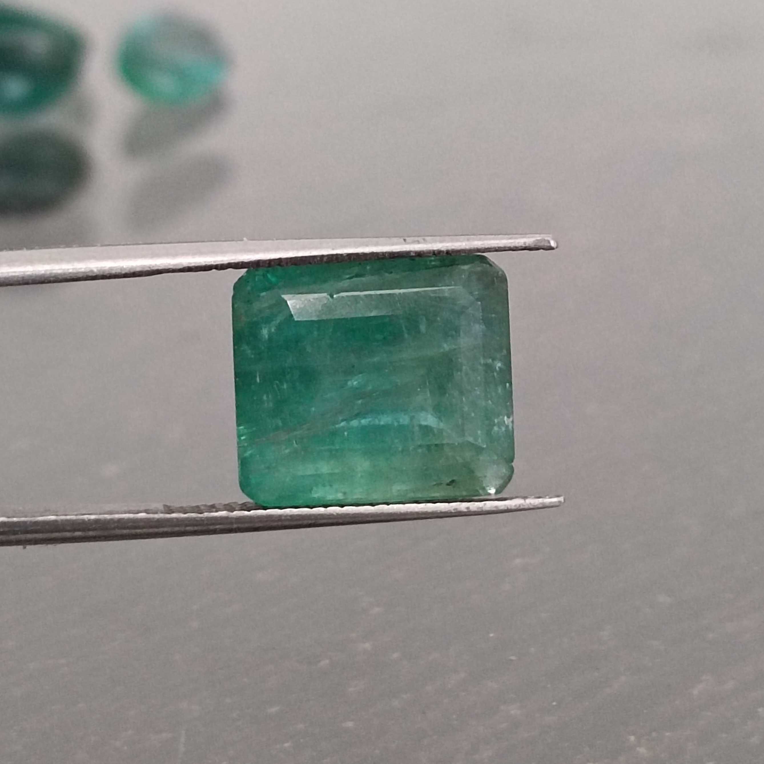 6.36ct deep green one side faceted emerald sugarloaf gem