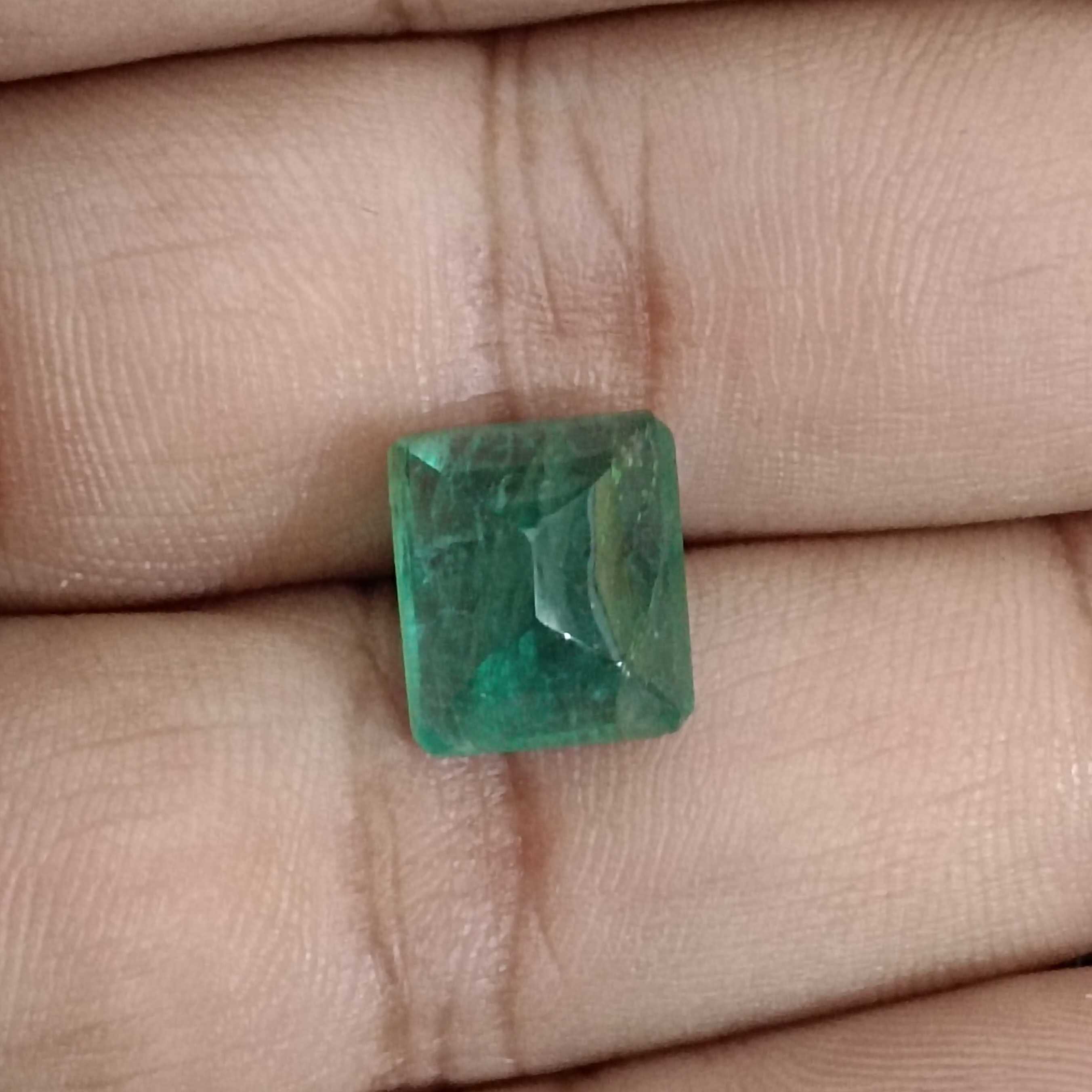 6.36ct deep green one side faceted emerald sugarloaf gem