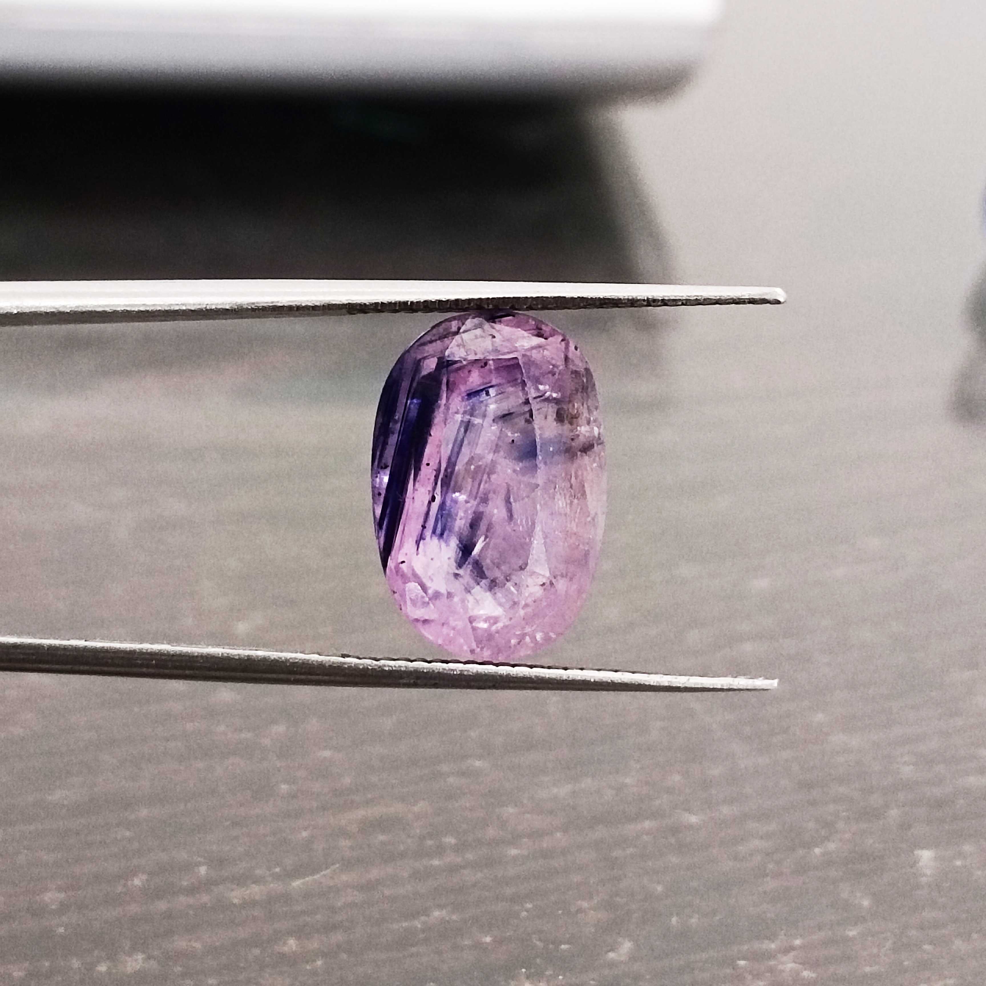 6.55ct bi color pink and blue oval cut sapphire AGR Certified 