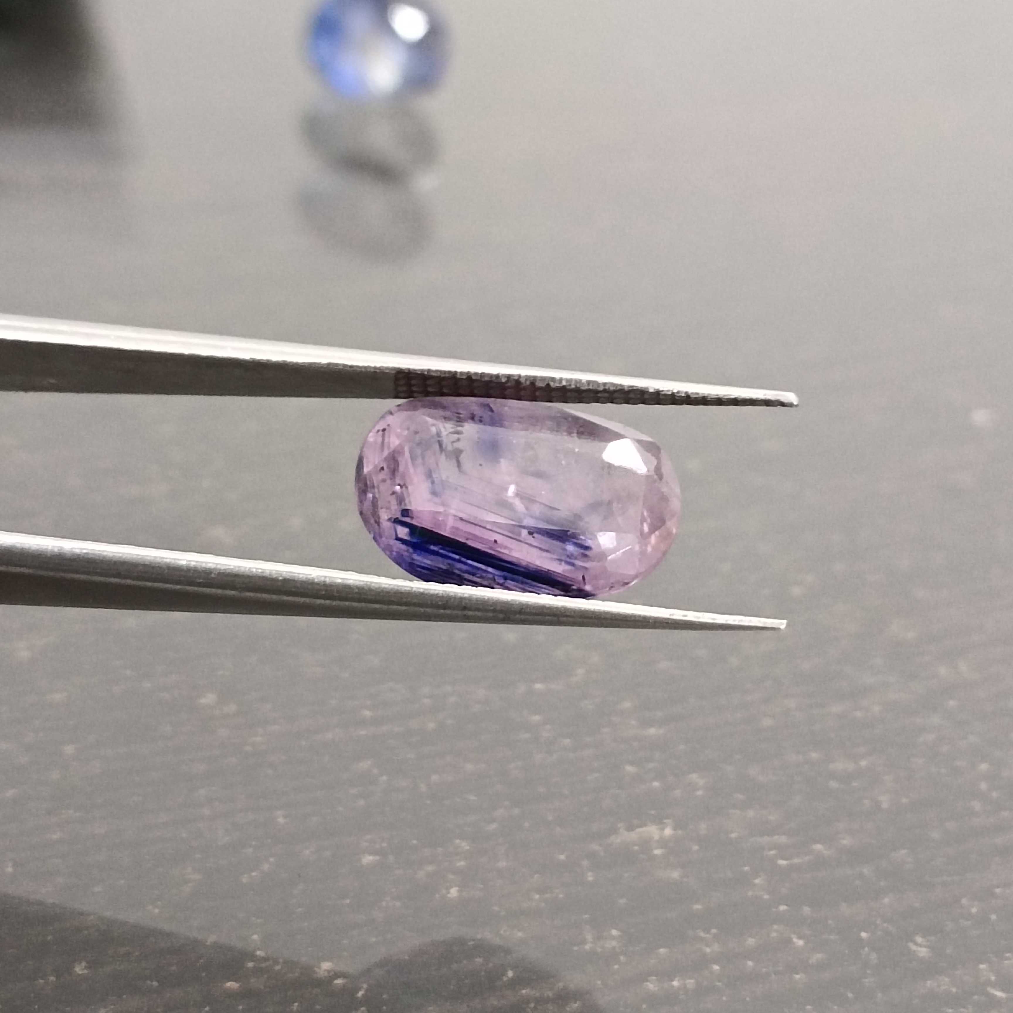 6.55ct bi color pink and blue oval cut sapphire AGR Certified 