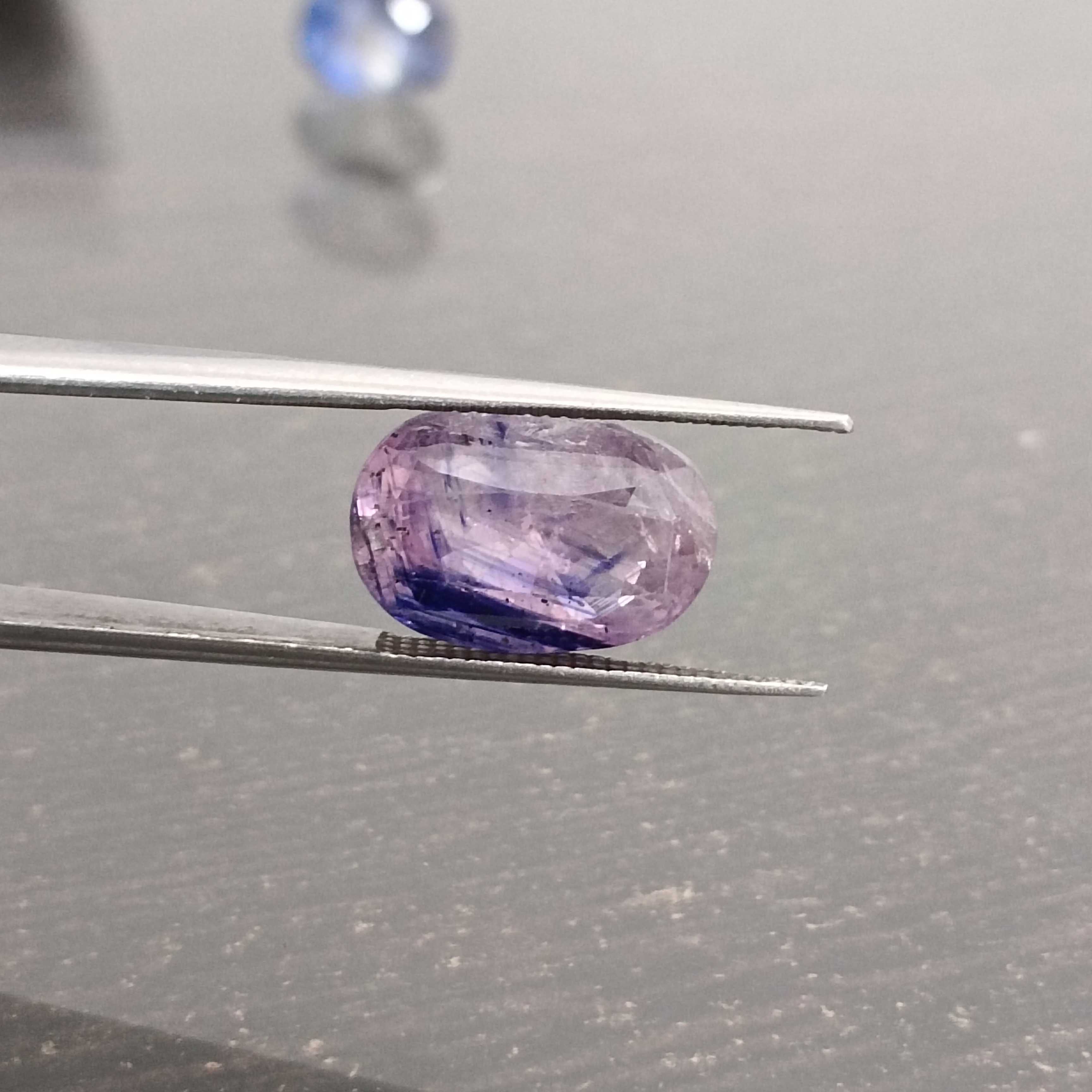 6.55ct bi color pink and blue oval cut sapphire AGR Certified 