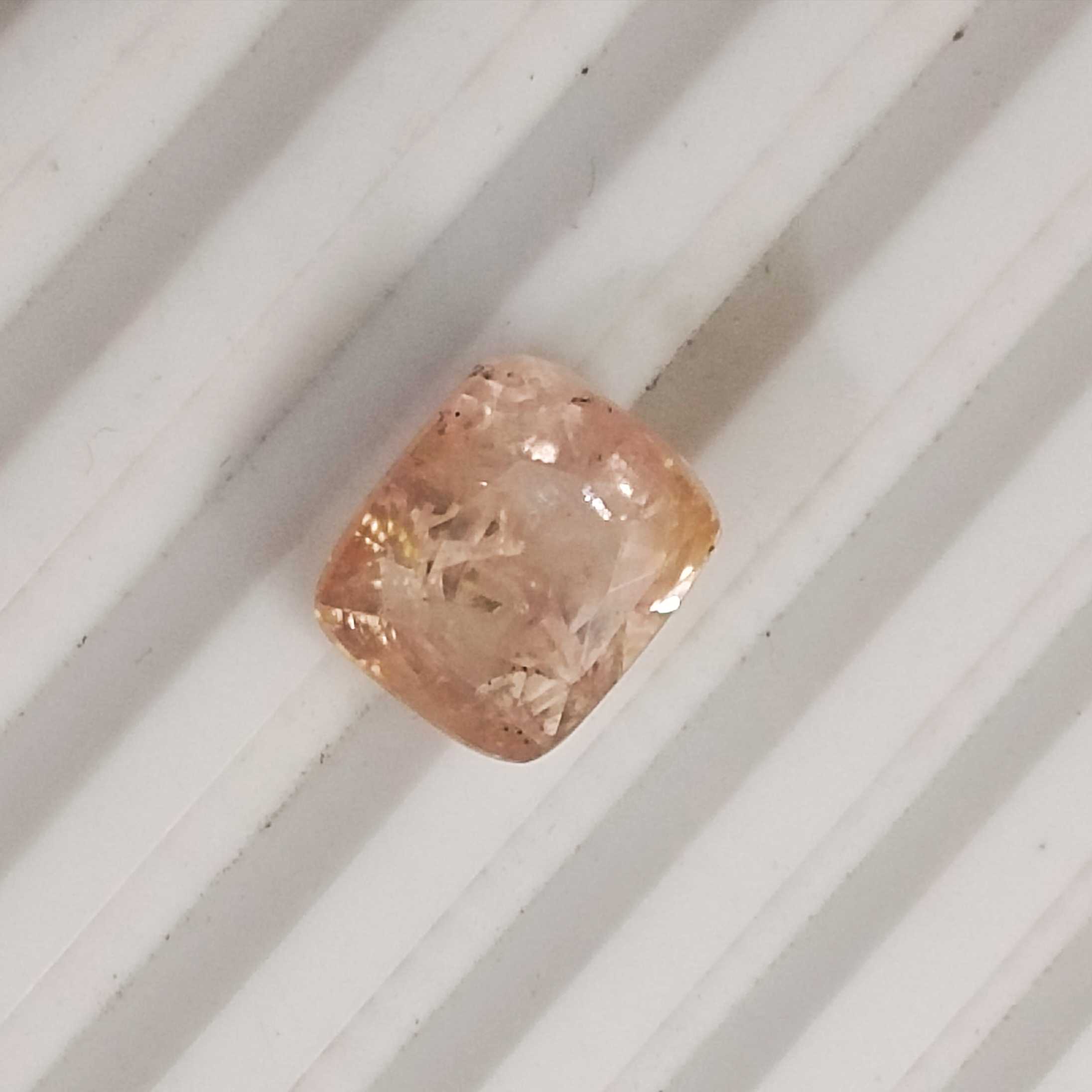 7.08ct IGI certified padparadscha sapphire cushion mix cut gem