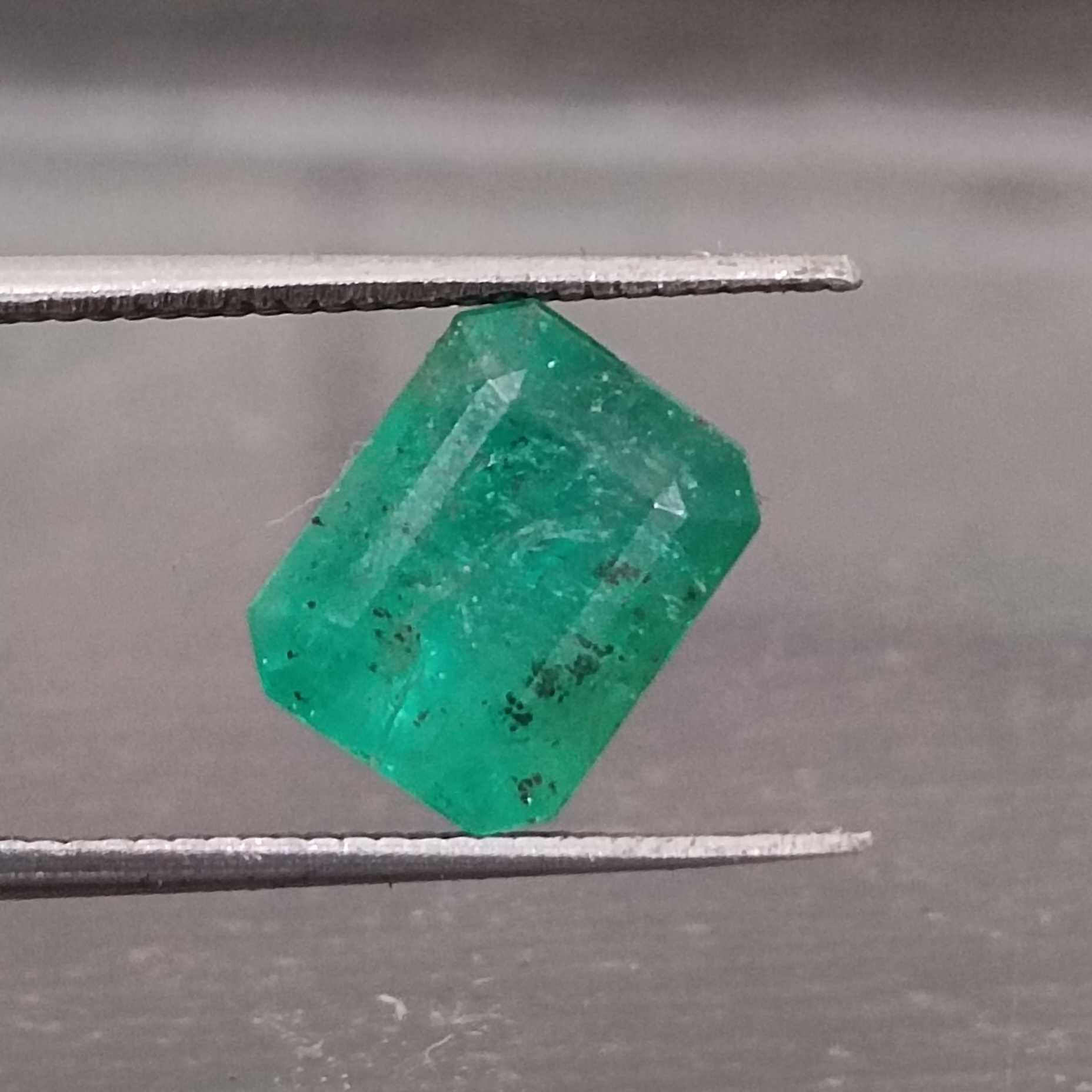 3.28ct medium vivid green emerald cut emerald/