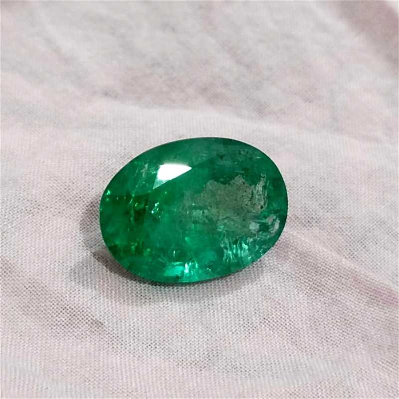 12.91ct vivid golden green color oval cut emerald