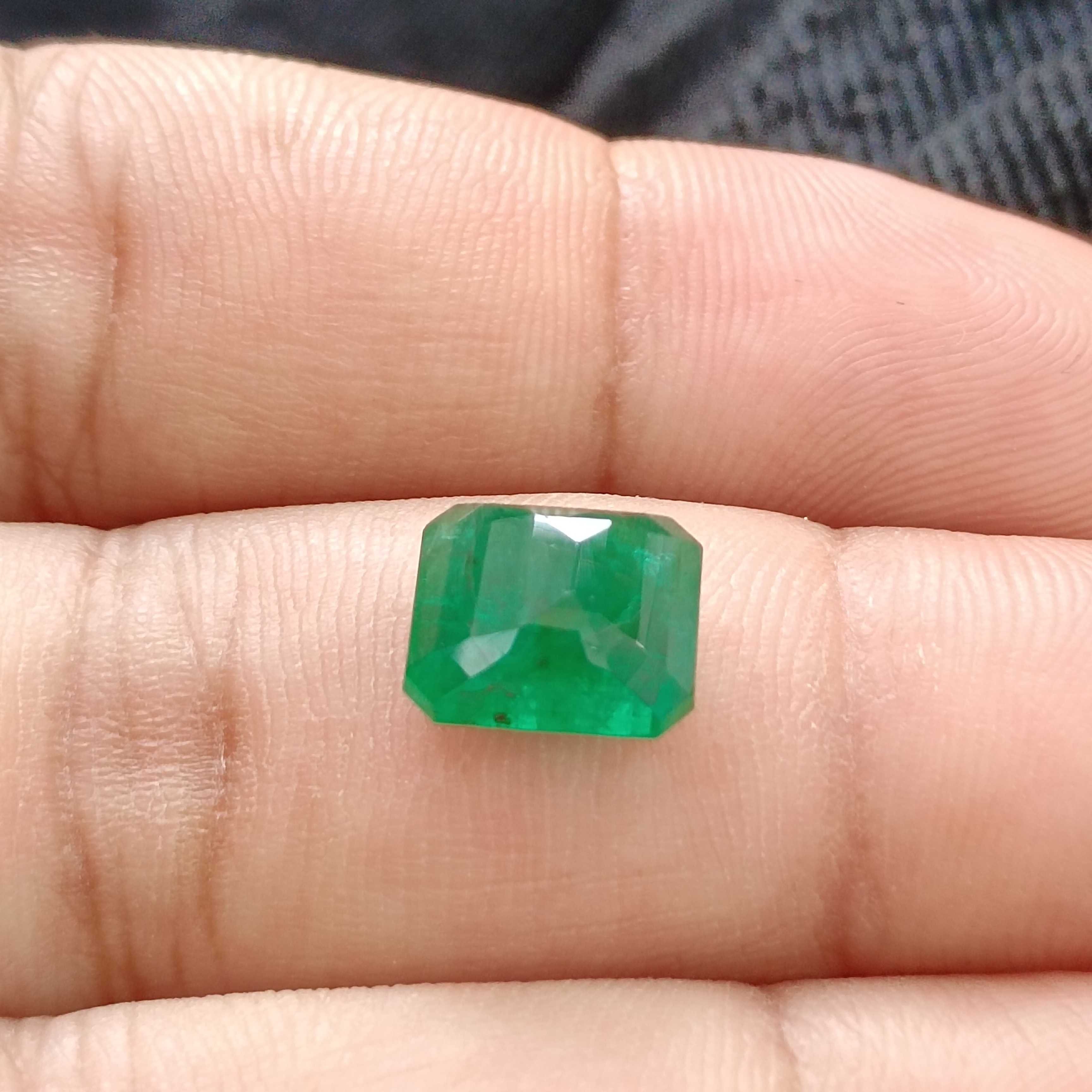 3.66ct dark green octagon cut Zambian emerald gem