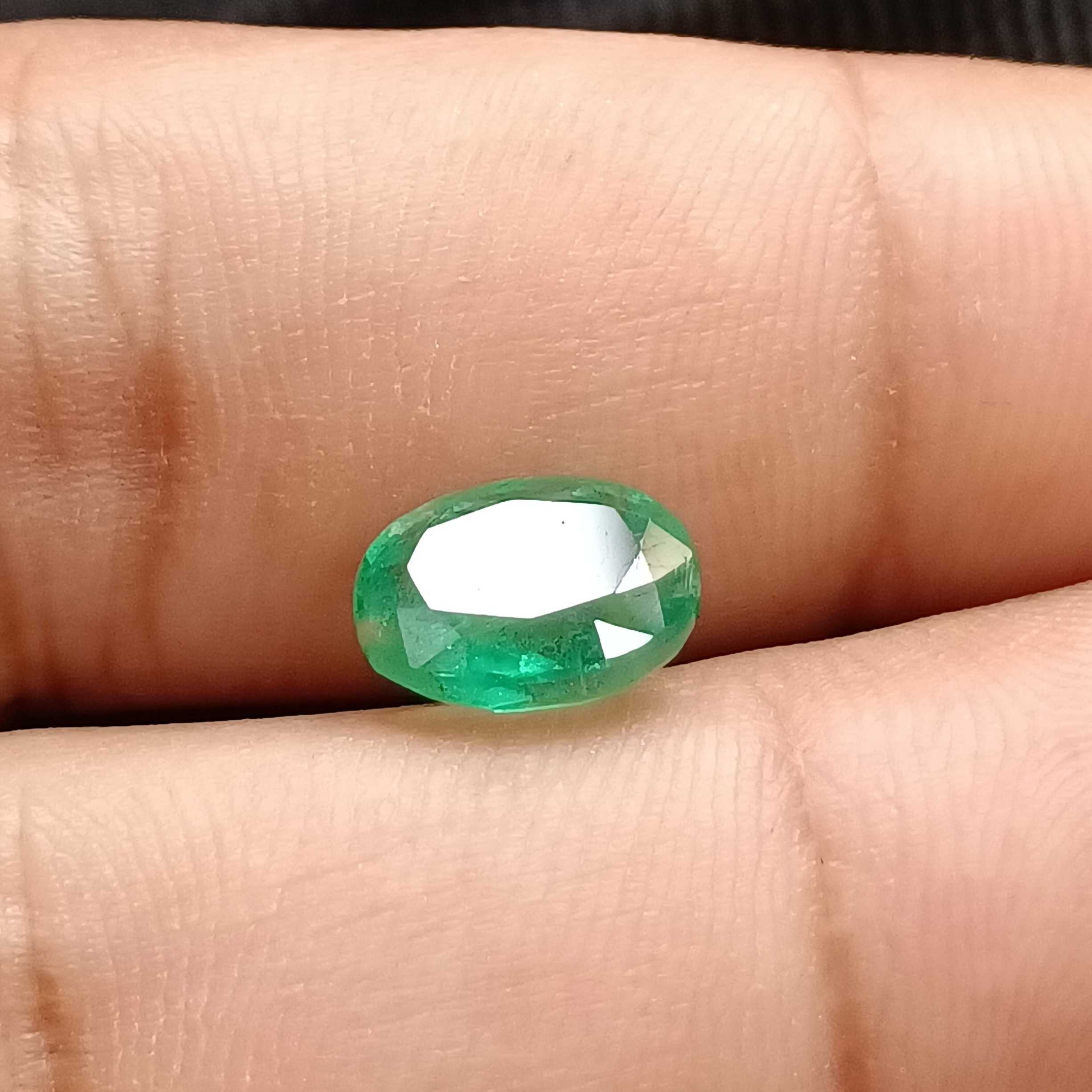 2.56 medium deep green oval cut emerald gemstone 