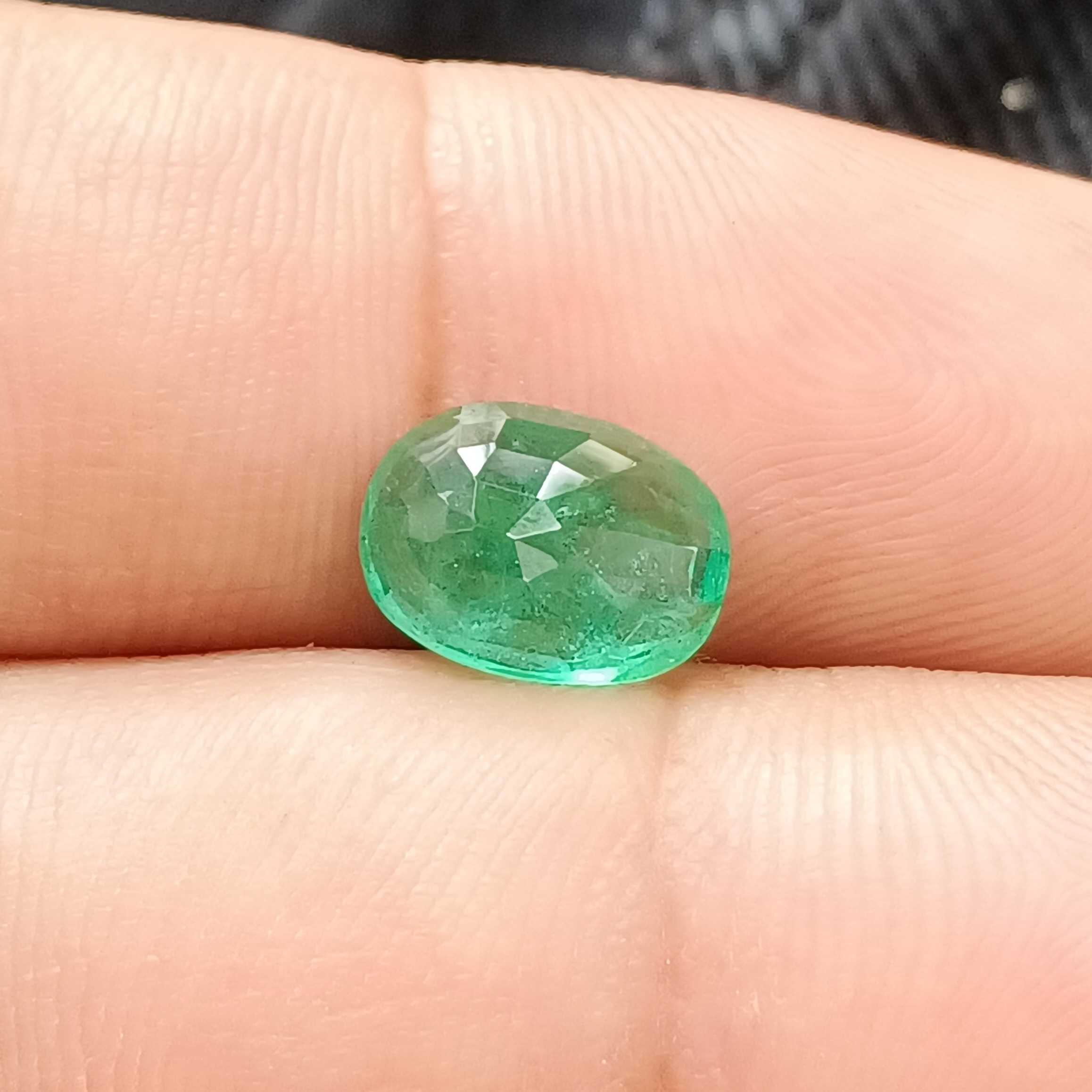 2.56 medium deep green oval cut emerald gemstone 