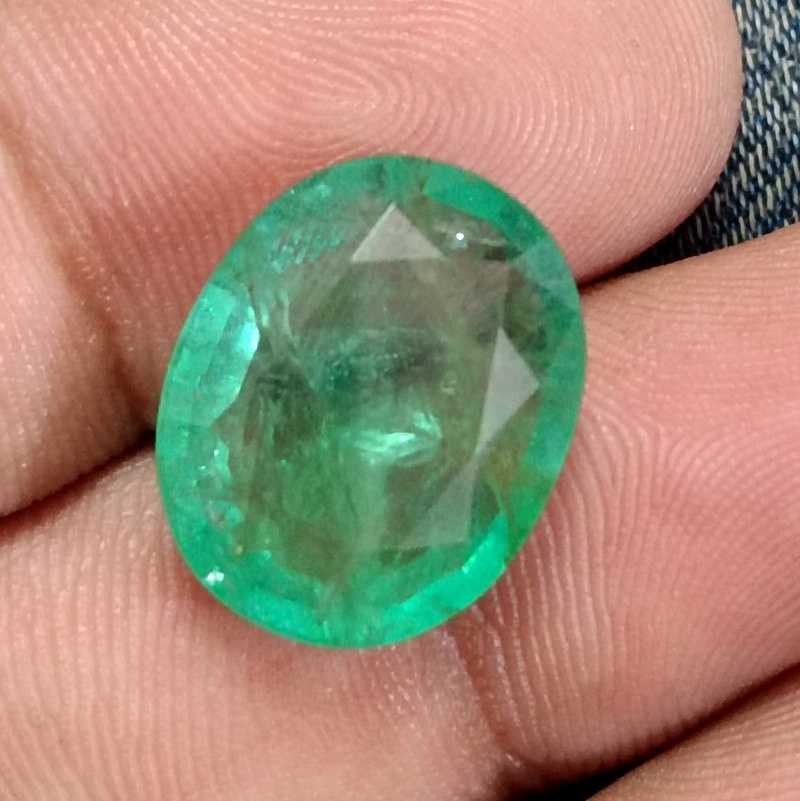 13.36ct IGI certified neon green Swat emerald gemstone 