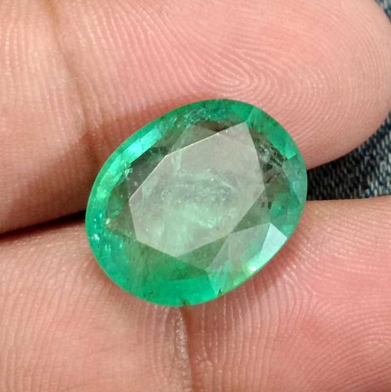 13.36ct IGI certified neon green Swat emerald gemstone 