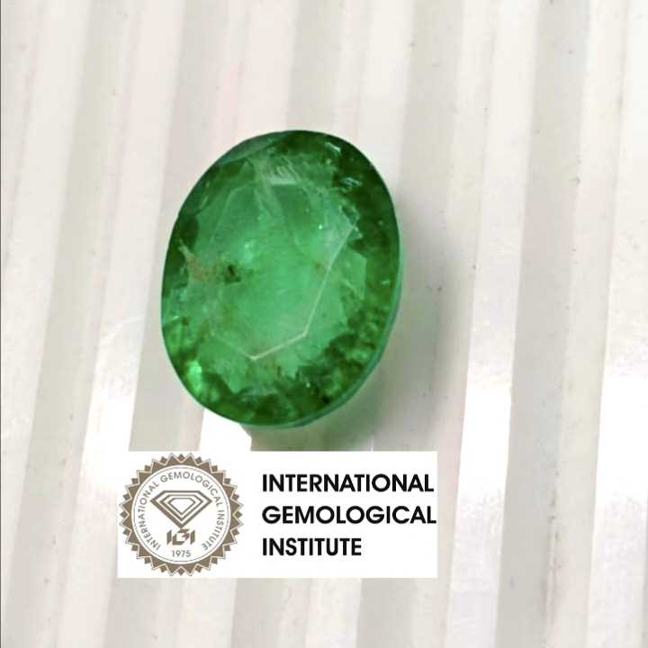 13.36ct IGI certified neon green Swat emerald gemstone  