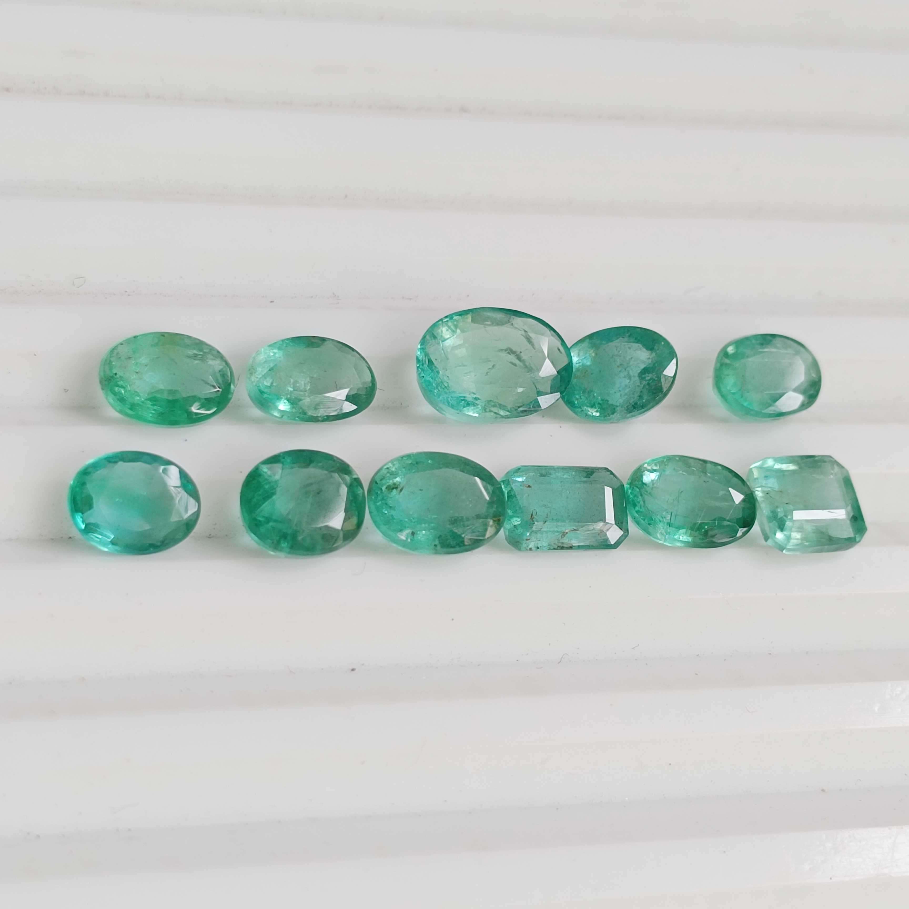 10.65ct light green emerald stone parcel 