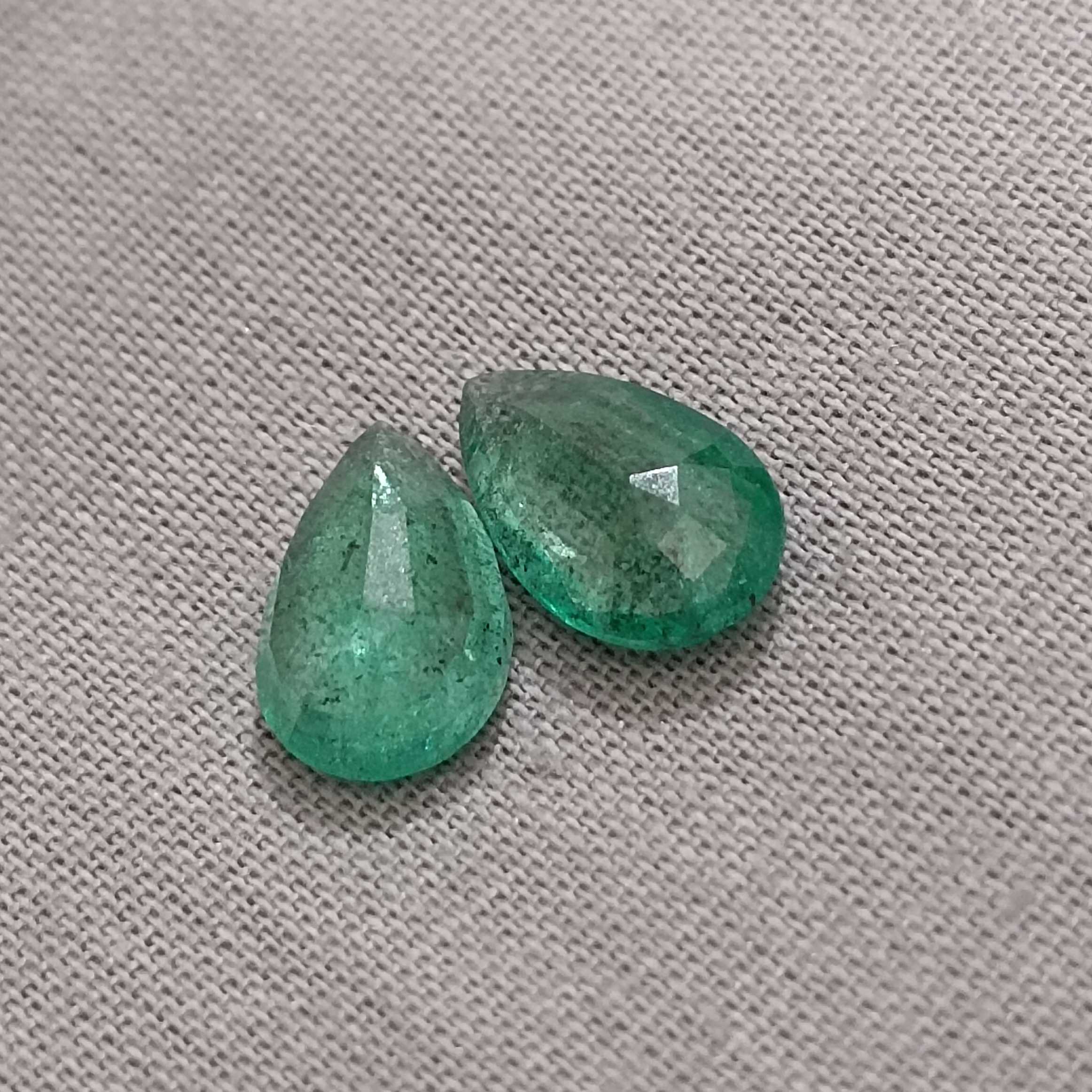 3.02ct golden green pear shape emerald gemstone pair