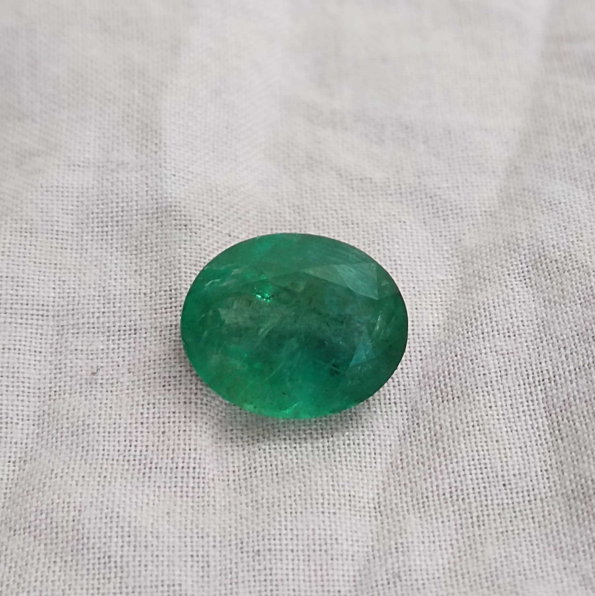 5.31ct deep forest green oval cut emerald gem