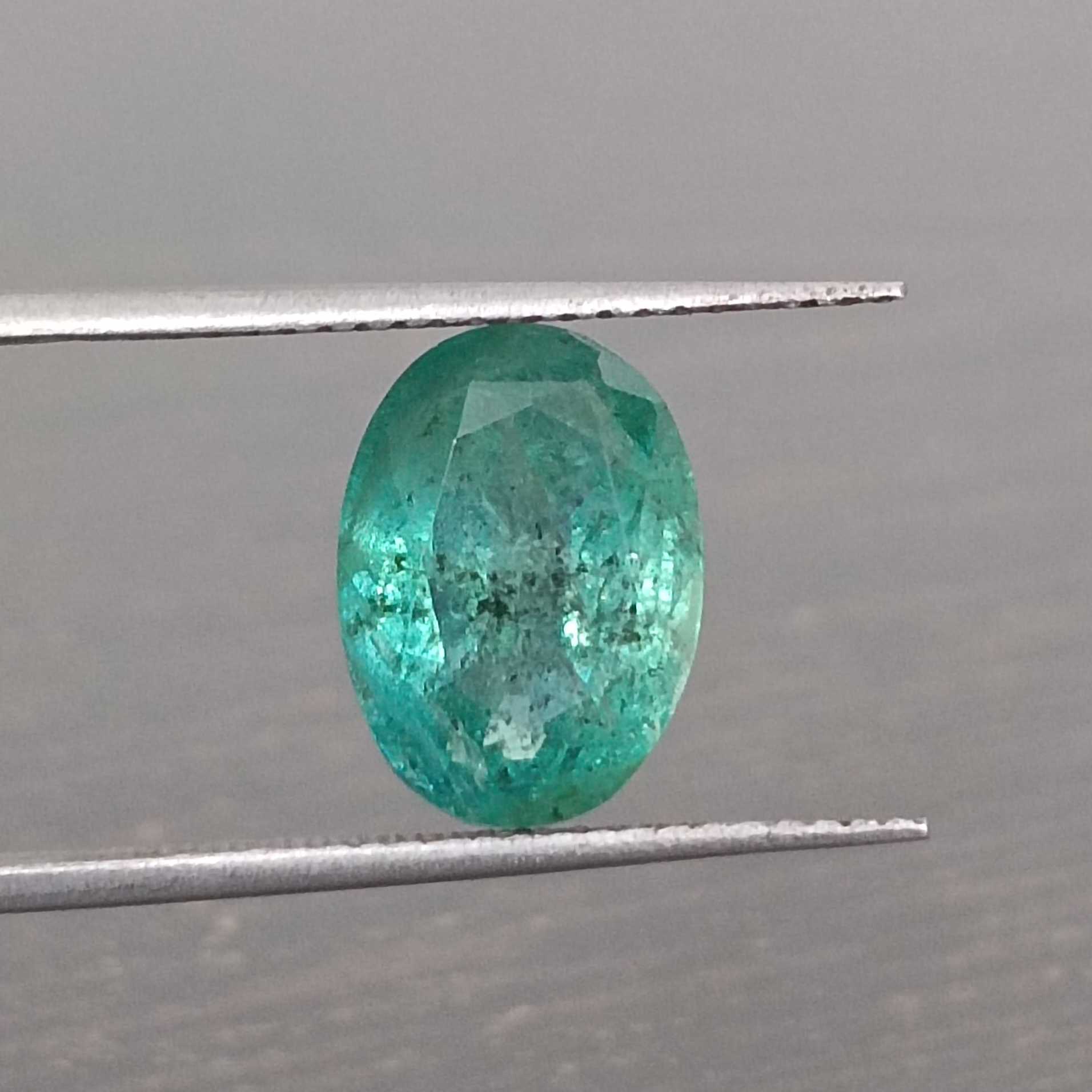 3.68ct deep green color oval cut emerald stone