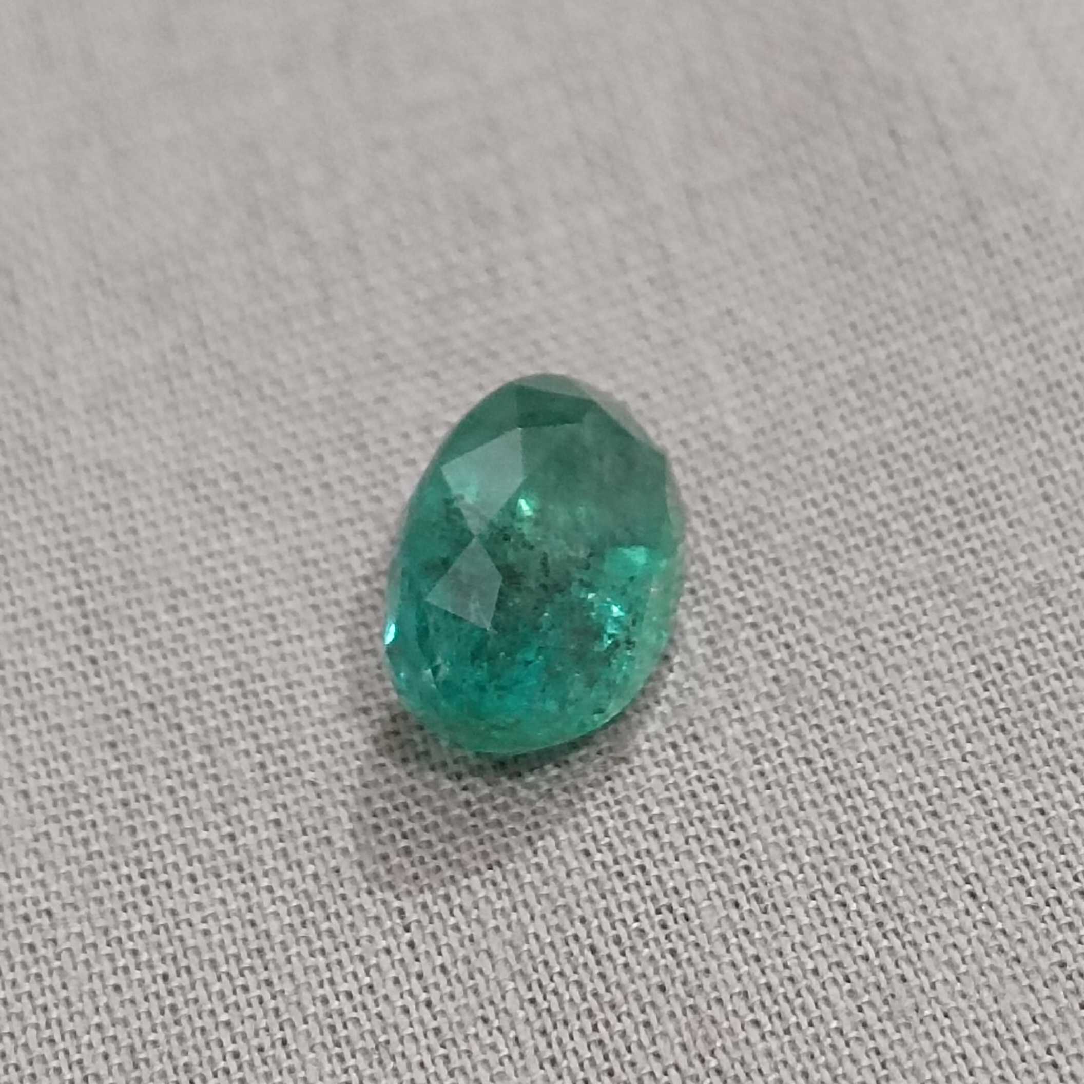 3.68ct deep green color oval cut emerald stone