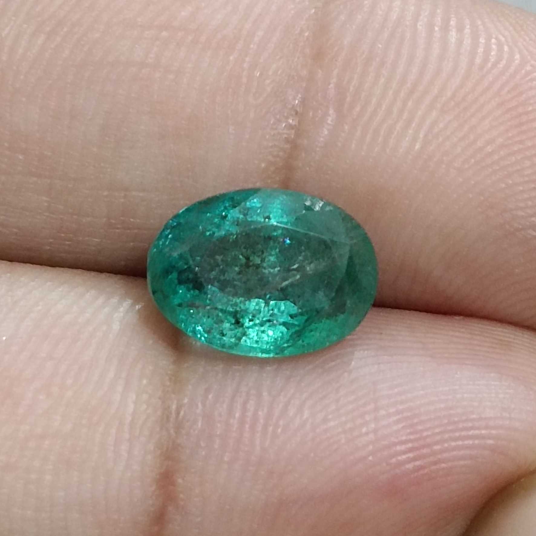 3.68ct deep green color oval cut emerald stone