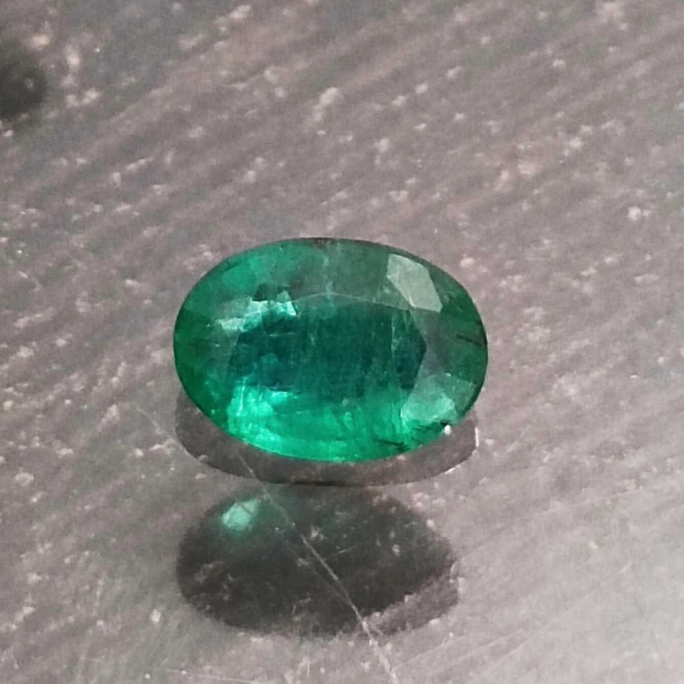 1.68ct deep pure green oval cut emerald gemstone 