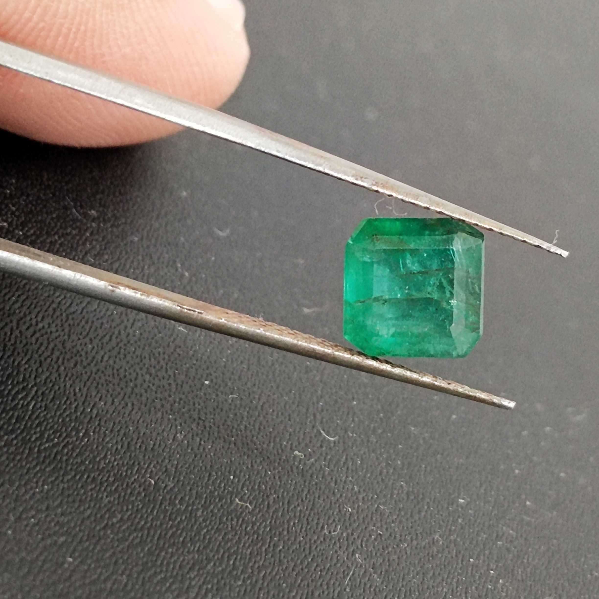 2.28ct deep green emerald gem with bluish and yellowish hue 