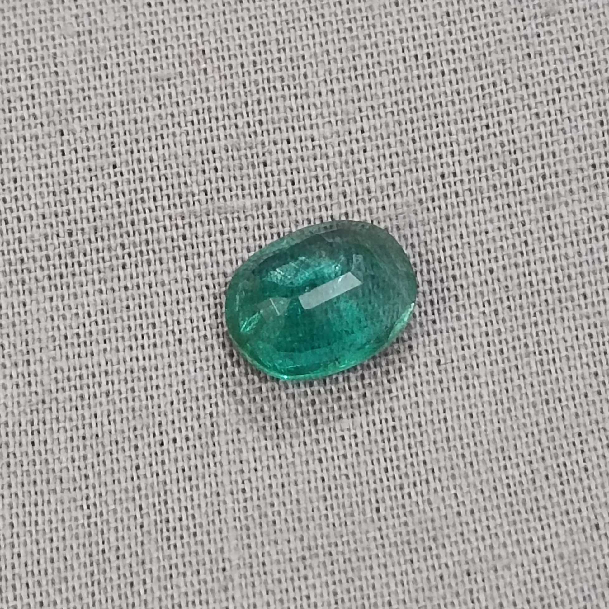 2.05ct clean medium green oval cut emerald stone